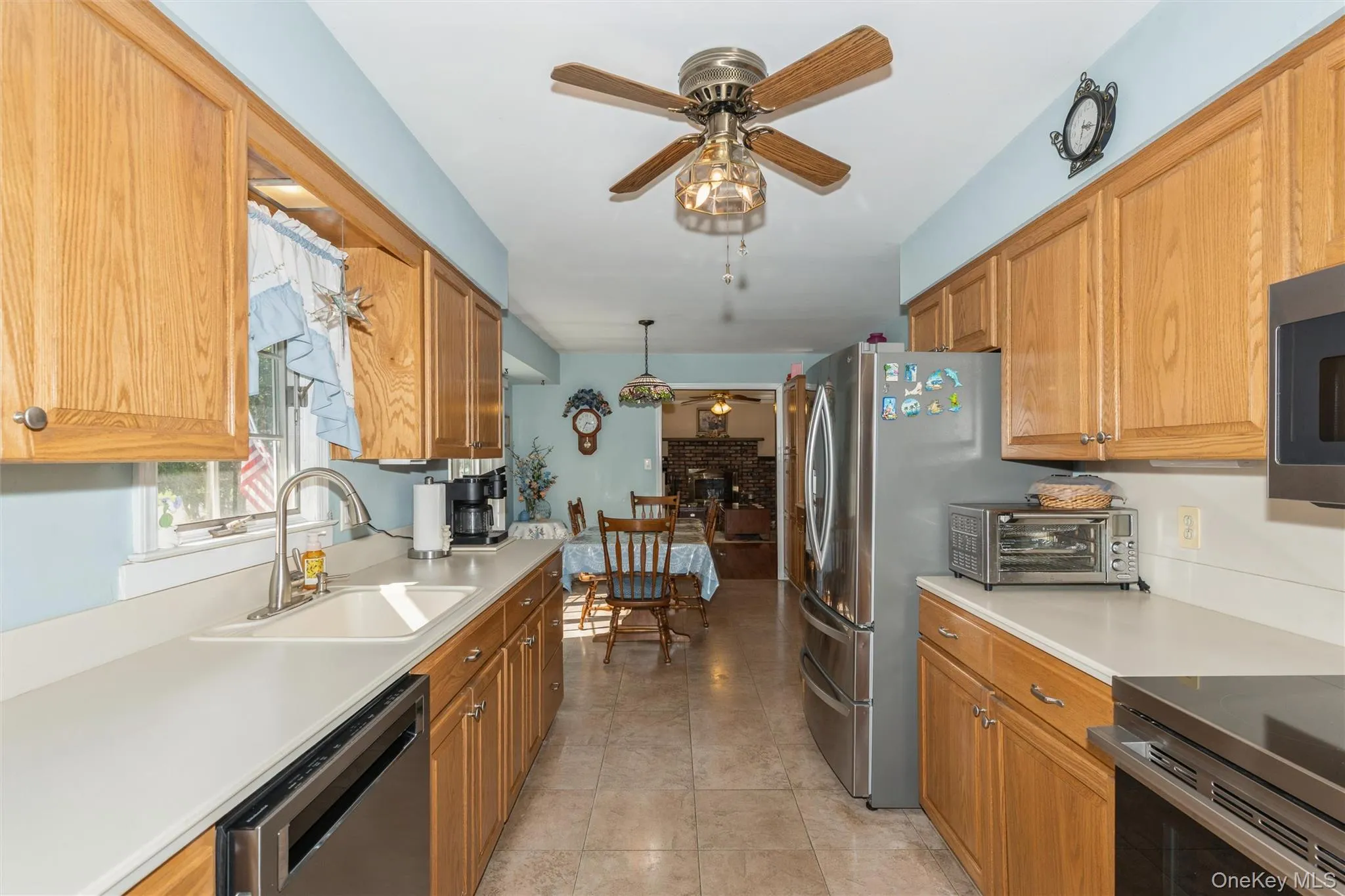 Lots of counter space and upgraded appliances make this bright kitchen a joy for creating your meals! Lots of counter space and upgraded appliances make this bright kitchen a joy for creating your meals!