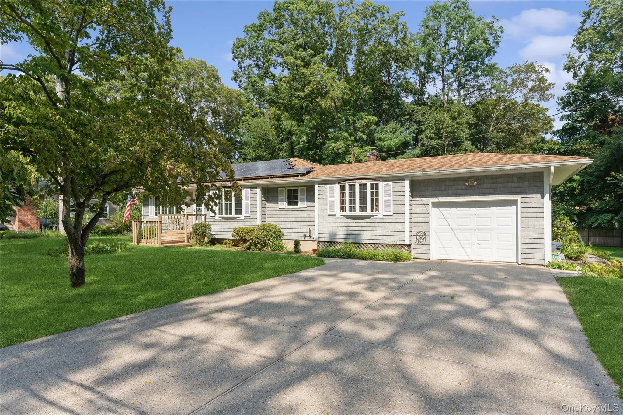 The welcoming & spacious wide driveway provides for lots of off street parking. The welcoming & spacious wide driveway provides for lots of off street parking.