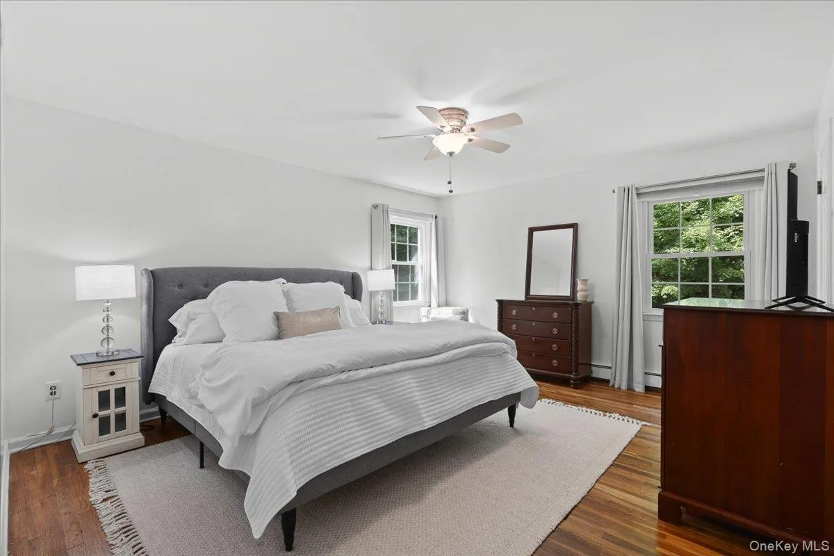 Large primary BR with ceiling fan. Large primary BR with ceiling fan.