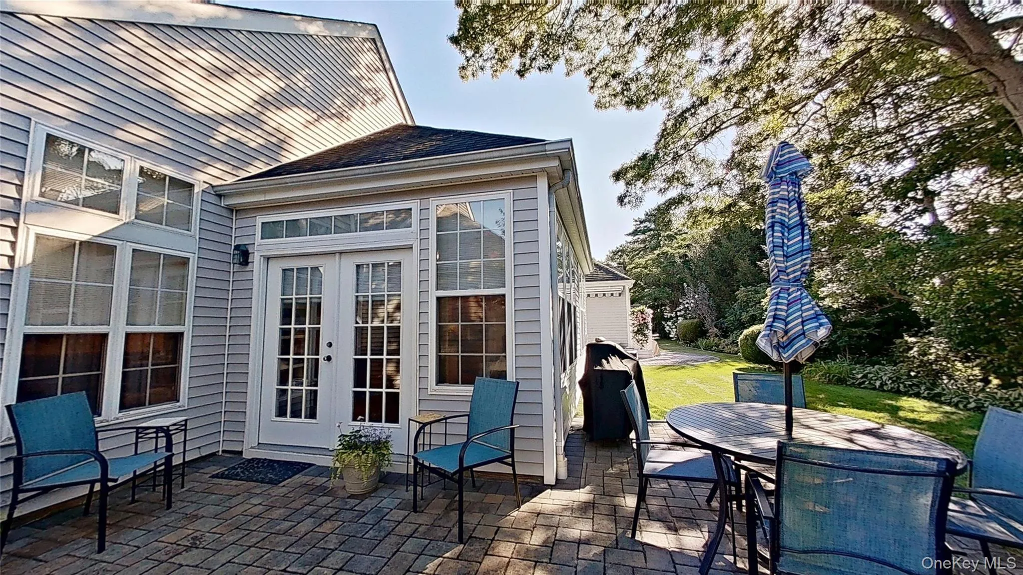 French doors to the sunroom and kitchen make entertaining or simply relaxing just steps away! French doors to the sunroom and kitchen make entertaining or simply relaxing just steps away!