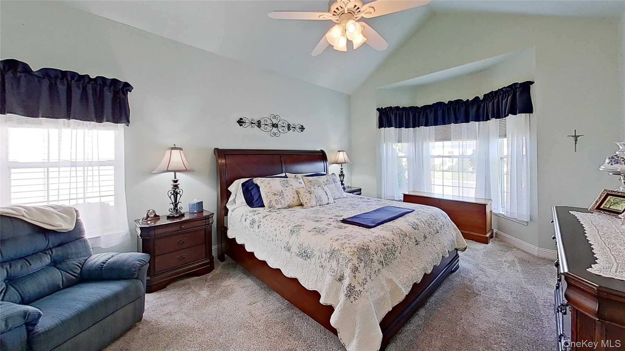 Lots of windows, vaulted ceiling with custom fan plus a walkout bay window! Lots of windows, vaulted ceiling with custom fan plus a walkout bay window!