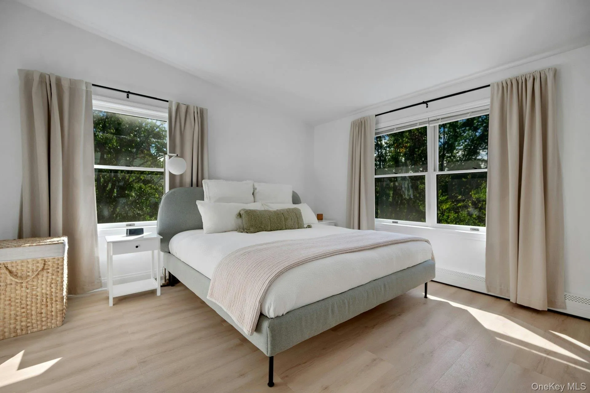 Spacious bright primary suite with seasonal views of bridge... Spacious bright primary suite with seasonal views of bridge...