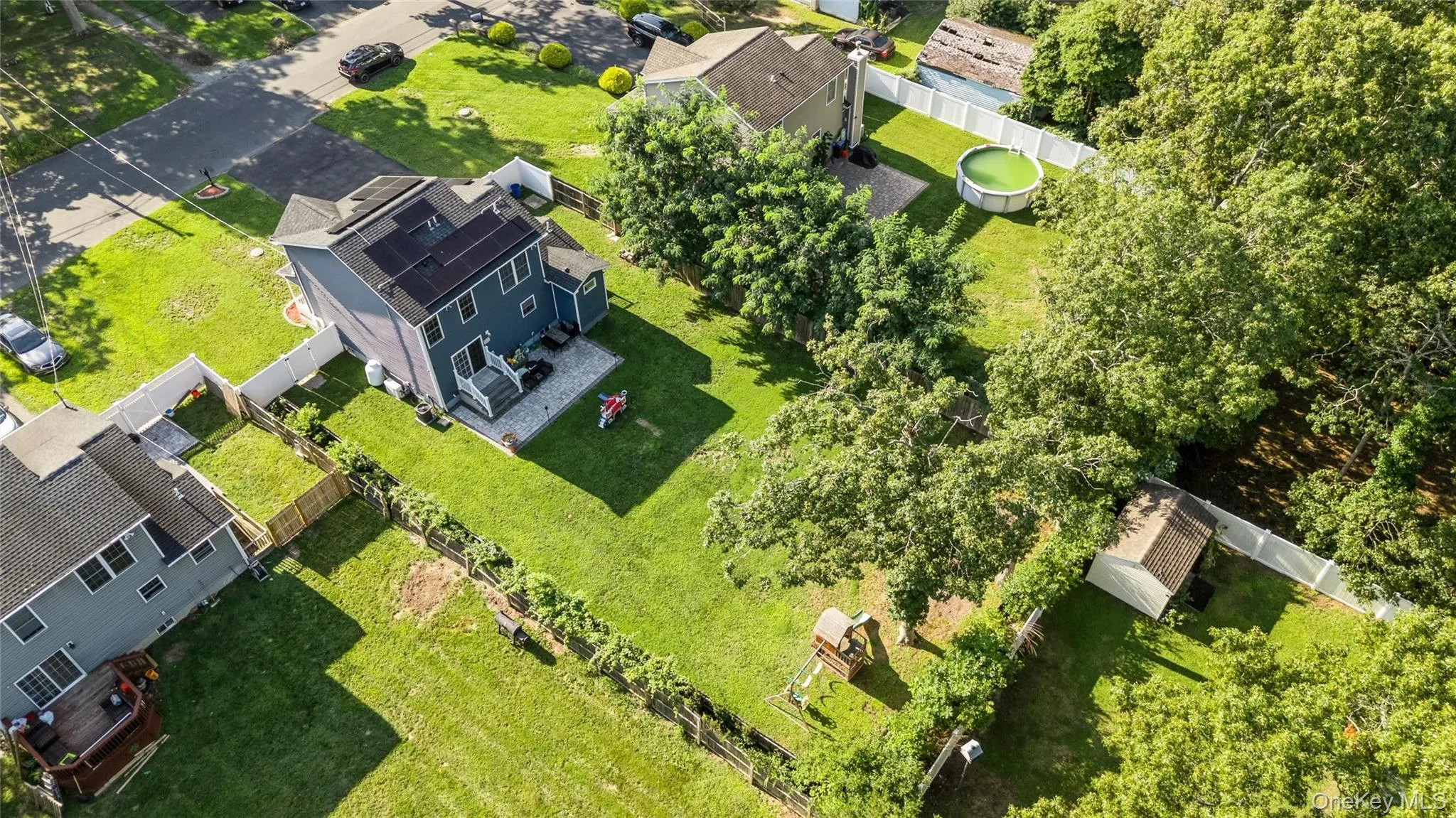 Aerial perspective showcasing a verdant landscape with extensive tree canopy Aerial perspective showcasing a verdant landscape with extensive tree canopy