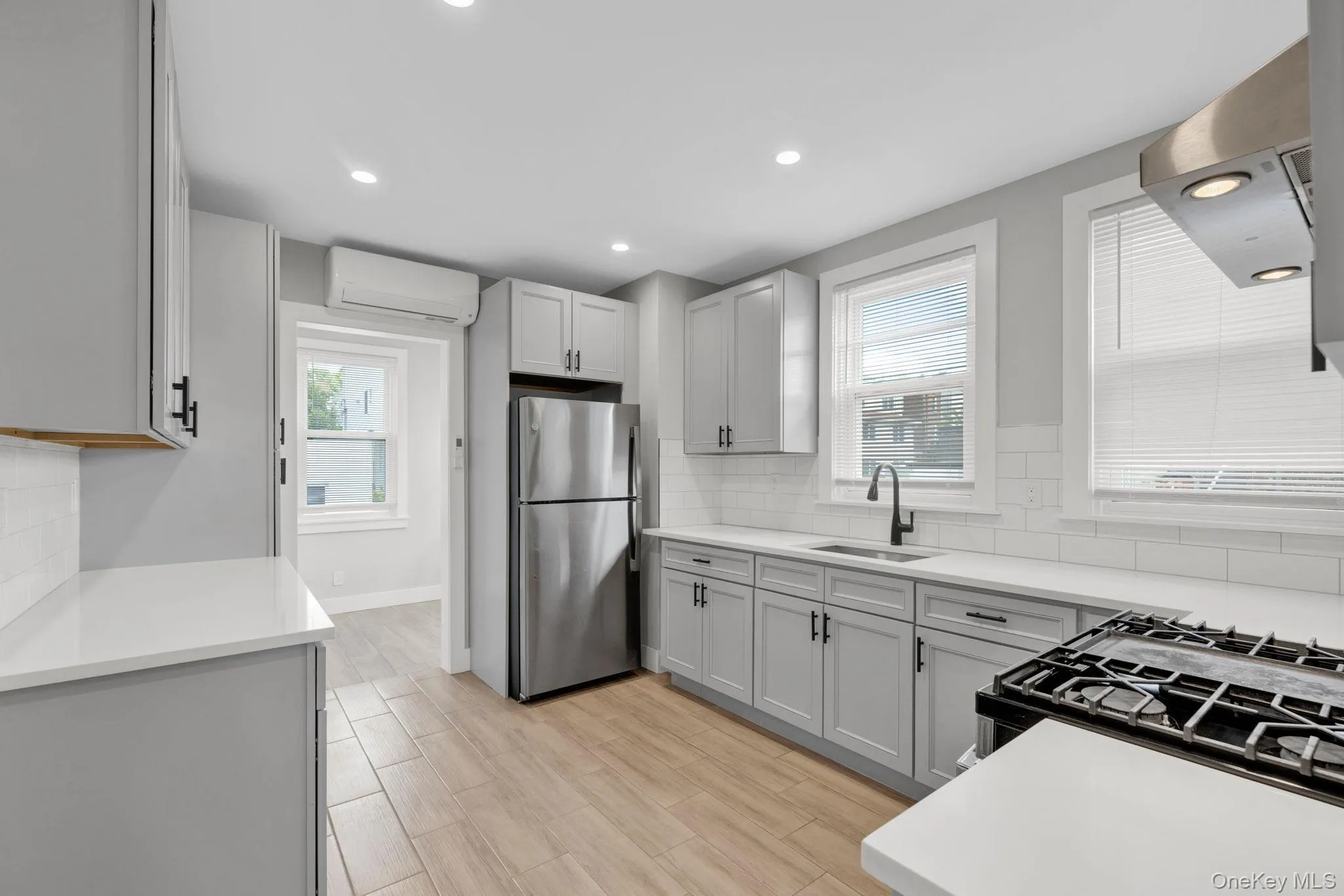 Bright, spacious kitchen with abundant cabinet and counter space.” Bright, spacious kitchen with abundant cabinet and counter space.”