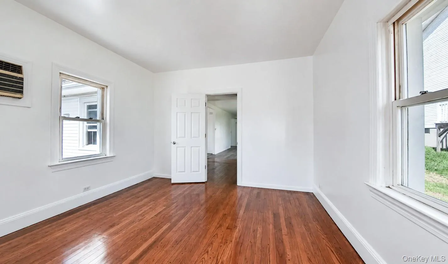 Bedroom 2 with hardwood flooring throughout Bedroom 2 with hardwood flooring throughout