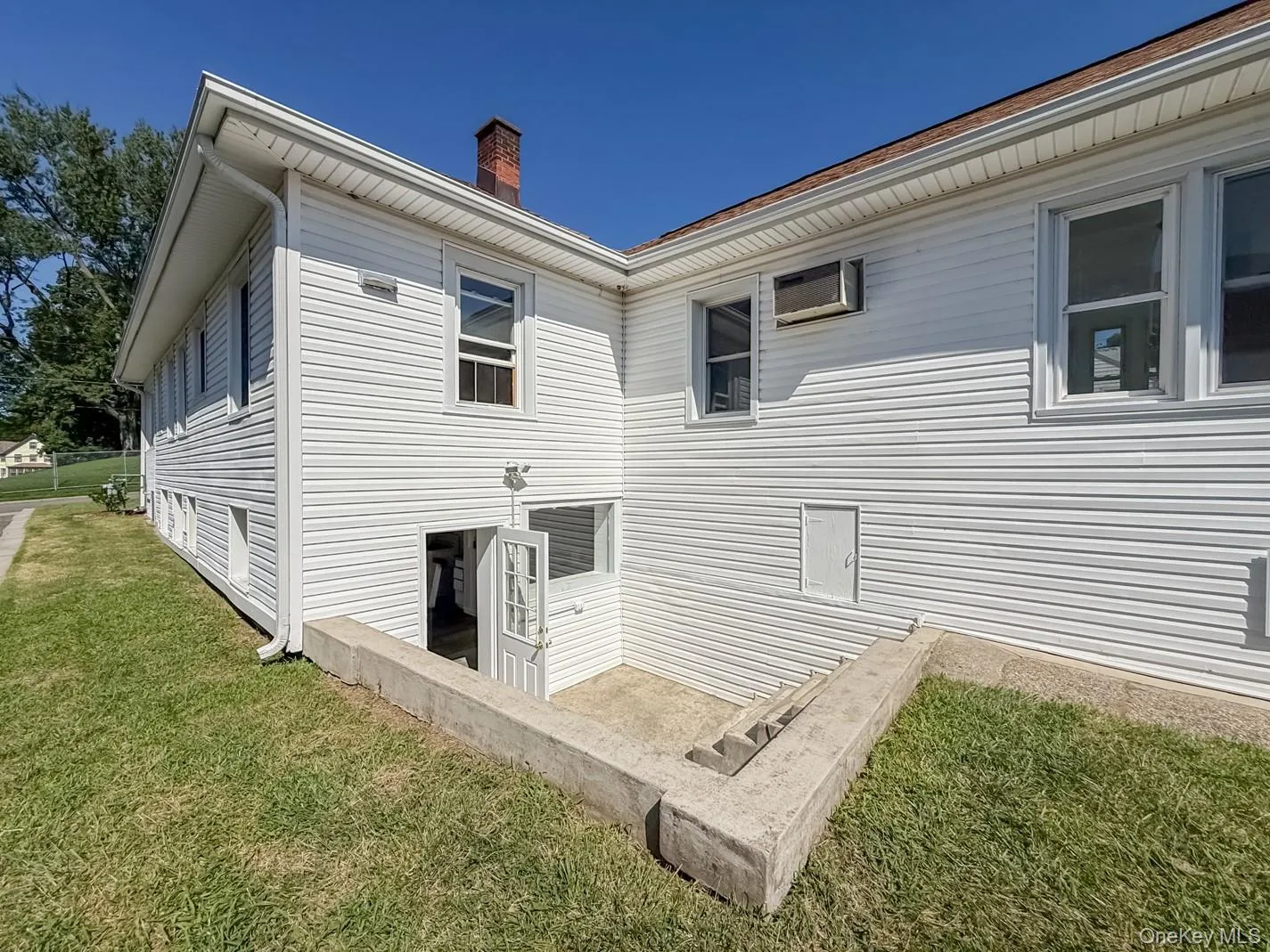 Walk out basement and small patio Walk out basement and small patio