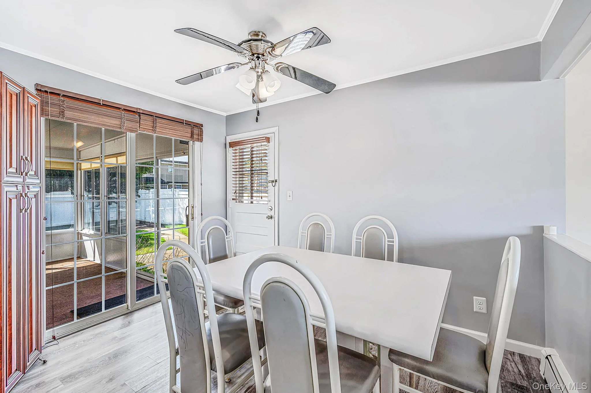 Spacious Dining Area, Sliders to Sunroom Spacious Dining Area, Sliders to Sunroom