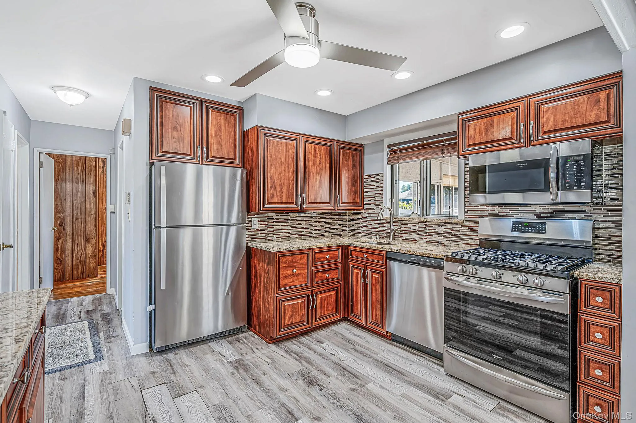 Updated EIK with SS Appliances, Gas Cooking, Large Dining Area, Sliders to Sunroom Updated EIK with SS Appliances, Gas Cooking, Large Dining Area, Sliders to Sunroom