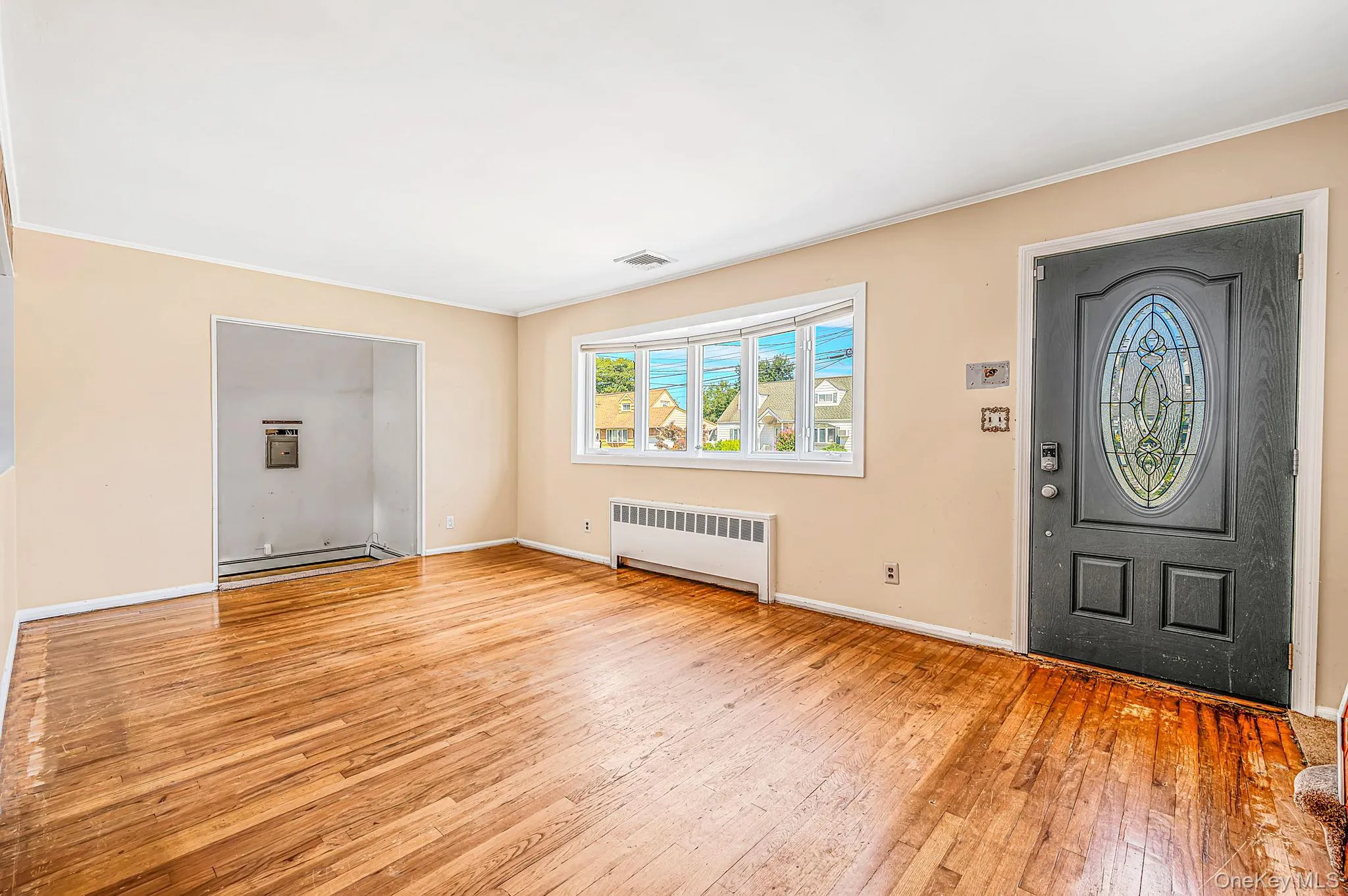 Spacious LR with HW Floors, Tons of Natural Light Spacious LR with HW Floors, Tons of Natural Light
