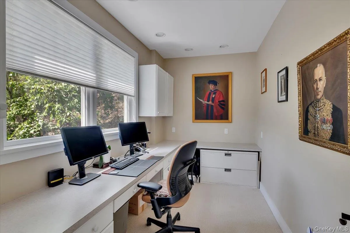 This 1st floor office is off the kitchen This 1st floor office is off the kitchen