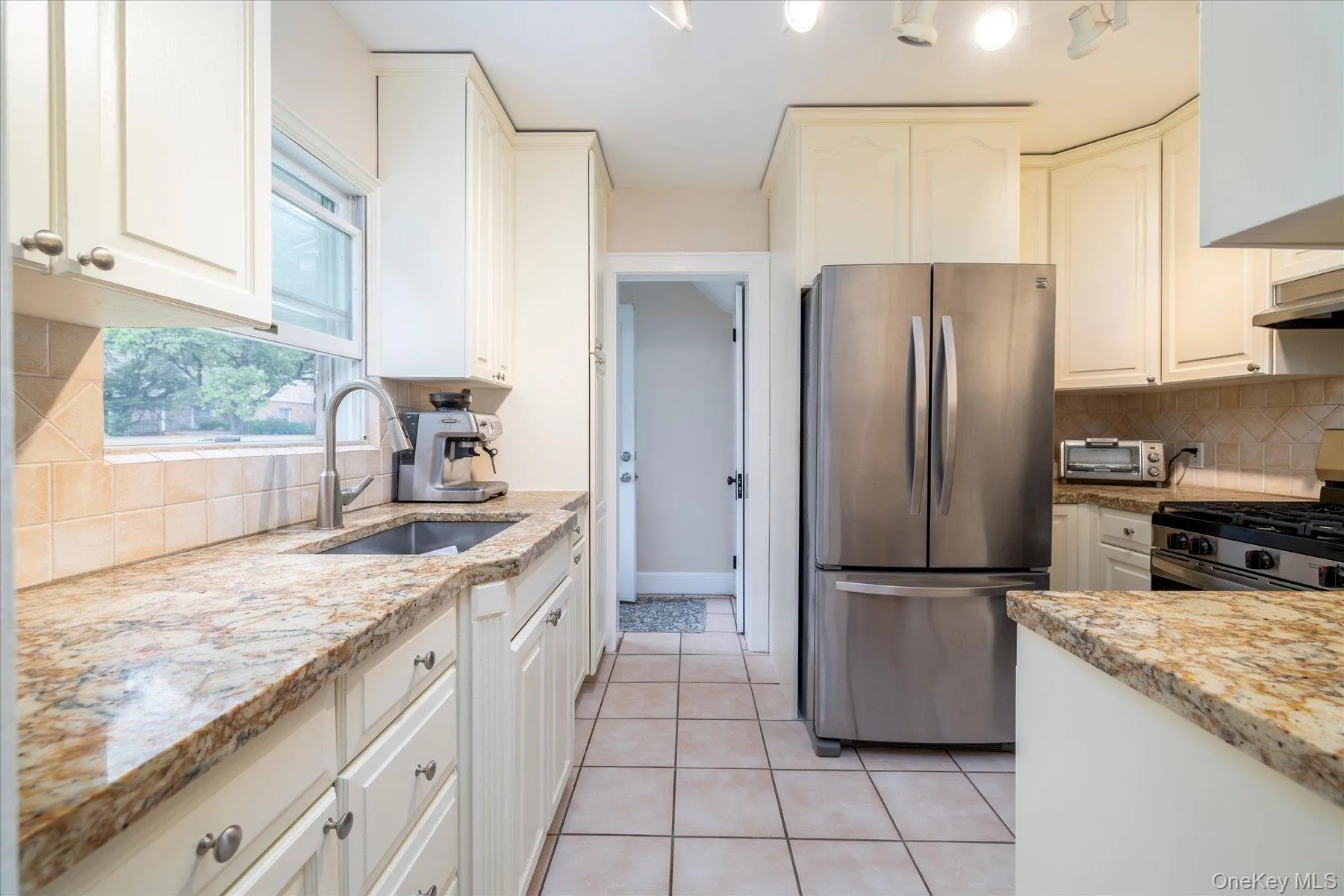 Renovated kitchen with granite counters Renovated kitchen with granite counters