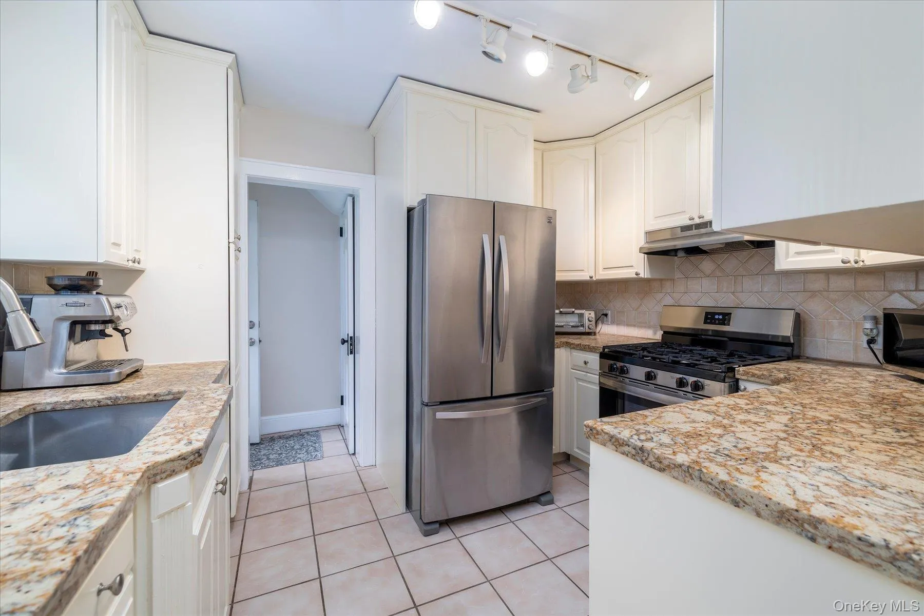 Renovated kitchen with brand new gas stove Renovated kitchen with brand new gas stove