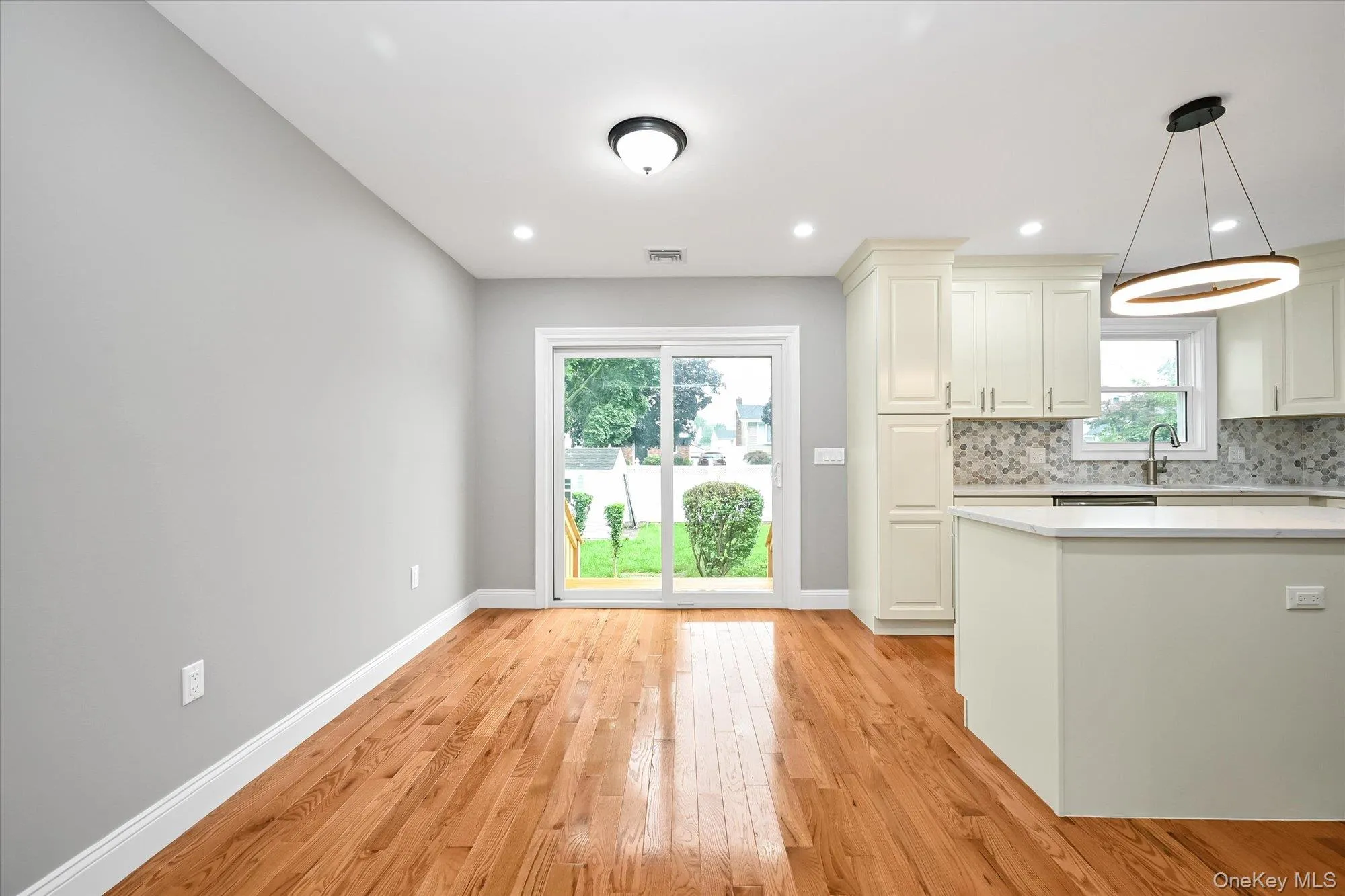 Dining Area next to Kitchen with Sliding Glass DOor Dining Area next to Kitchen with Sliding Glass DOor