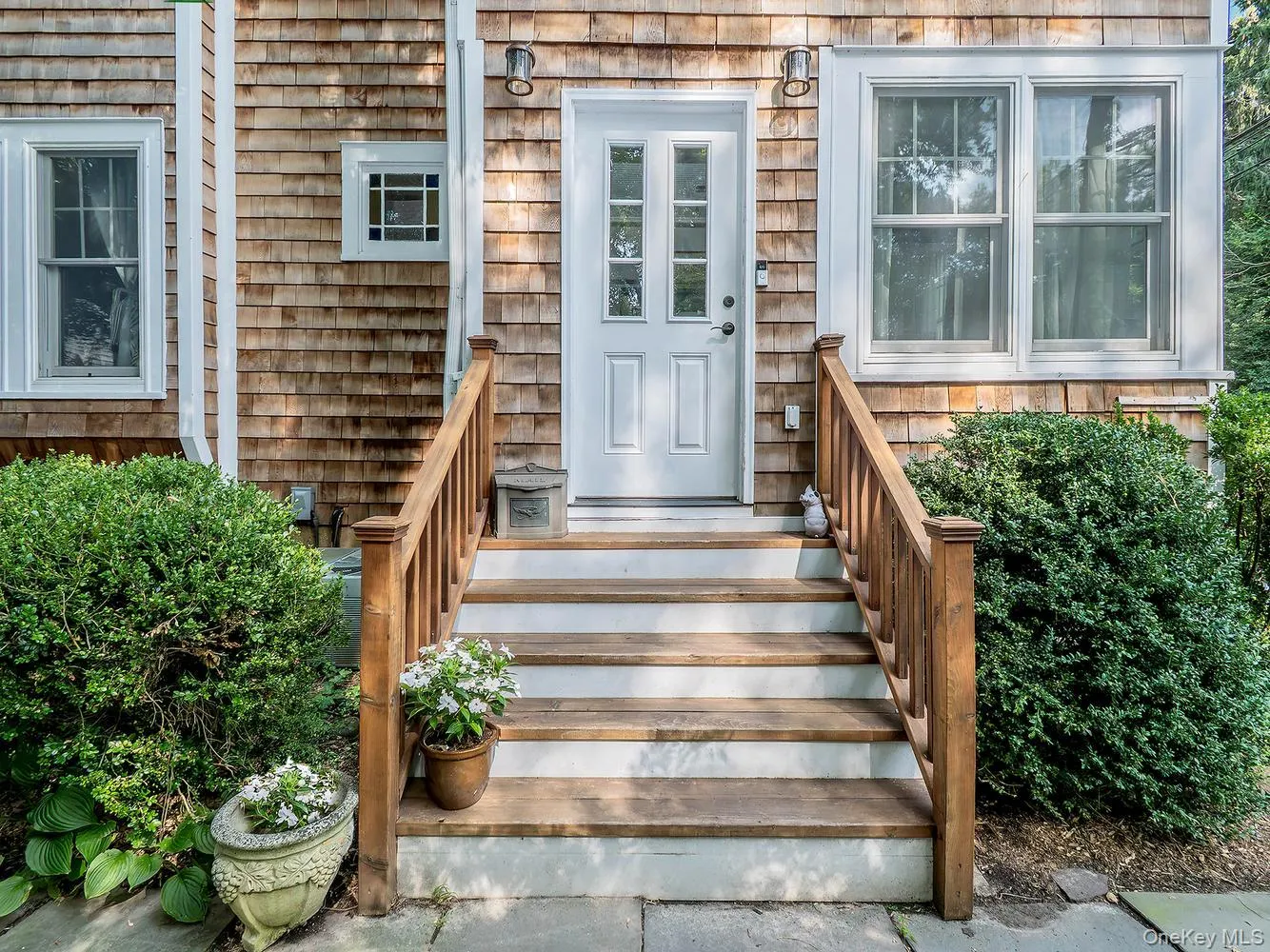 It's neat landscaping and a welcoming entryway that sets a warm first impression It's neat landscaping and a welcoming entryway that sets a warm first impression