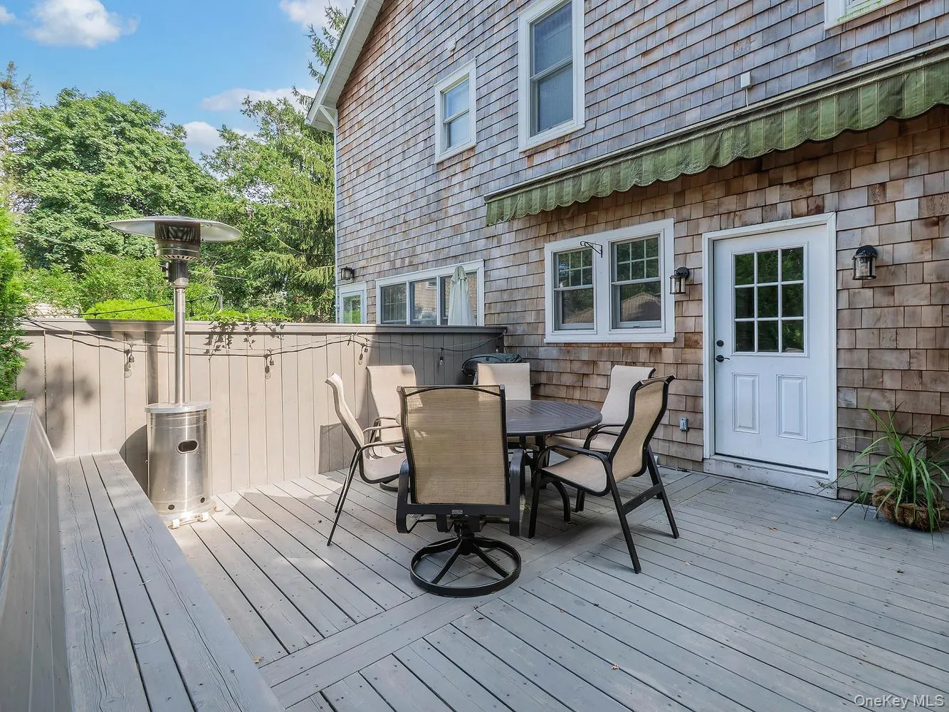 Deck with lots of seating off the kitchen Deck with lots of seating off the kitchen