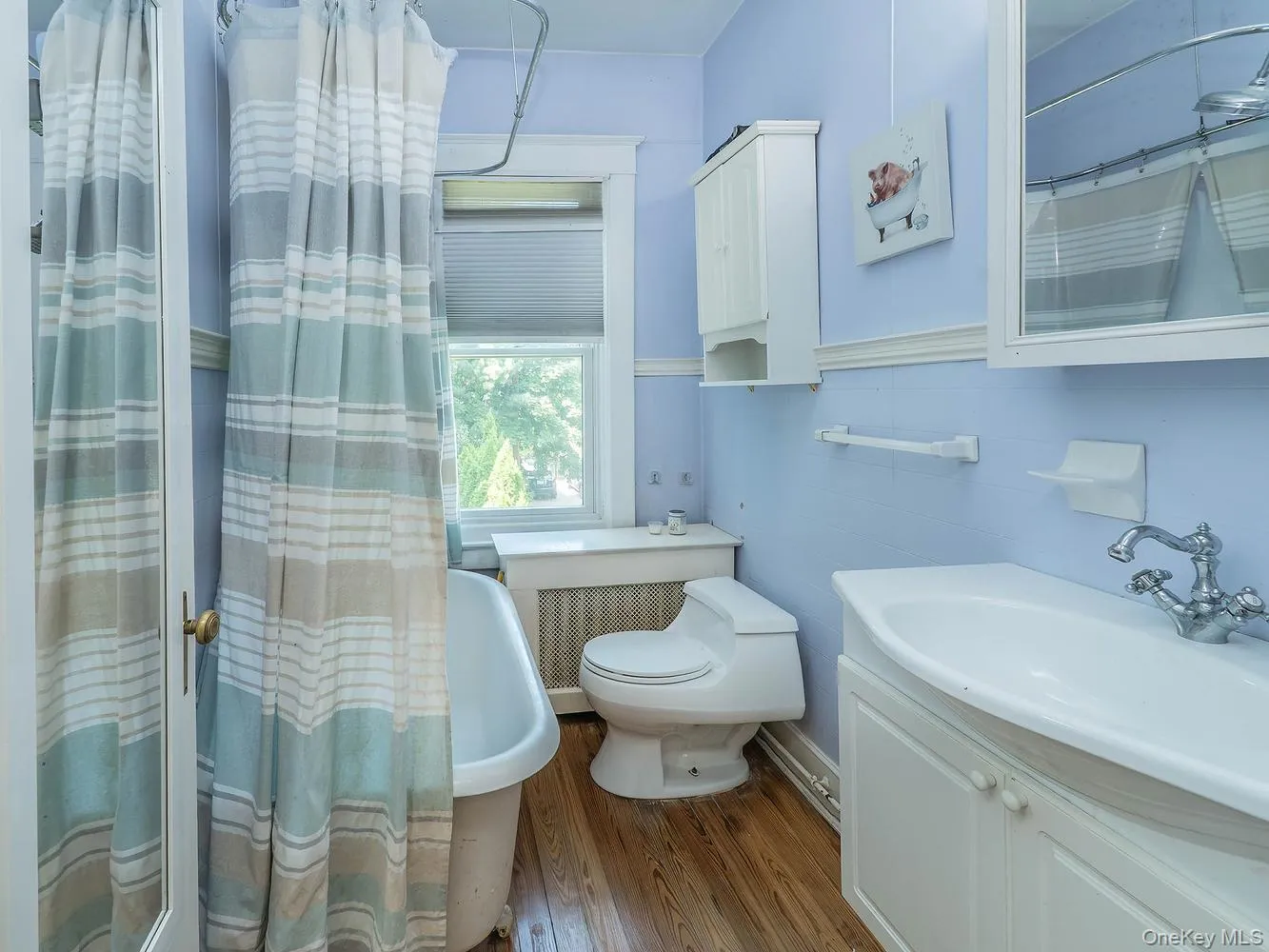 Second floor bathroom features a classic clawfoot tub bringing a touch of vintage charm Second floor bathroom features a classic clawfoot tub bringing a touch of vintage charm