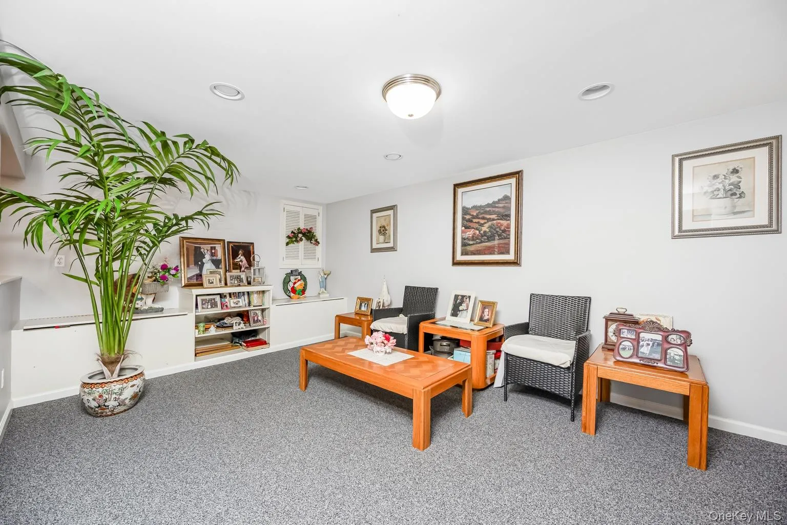 Recessed lighting, flush mount ceiling fixture, built-in cabinetry, built-in shelving, and carpeted flooring Recessed lighting, flush mount ceiling fixture, built-in cabinetry, built-in shelving, and carpeted flooring