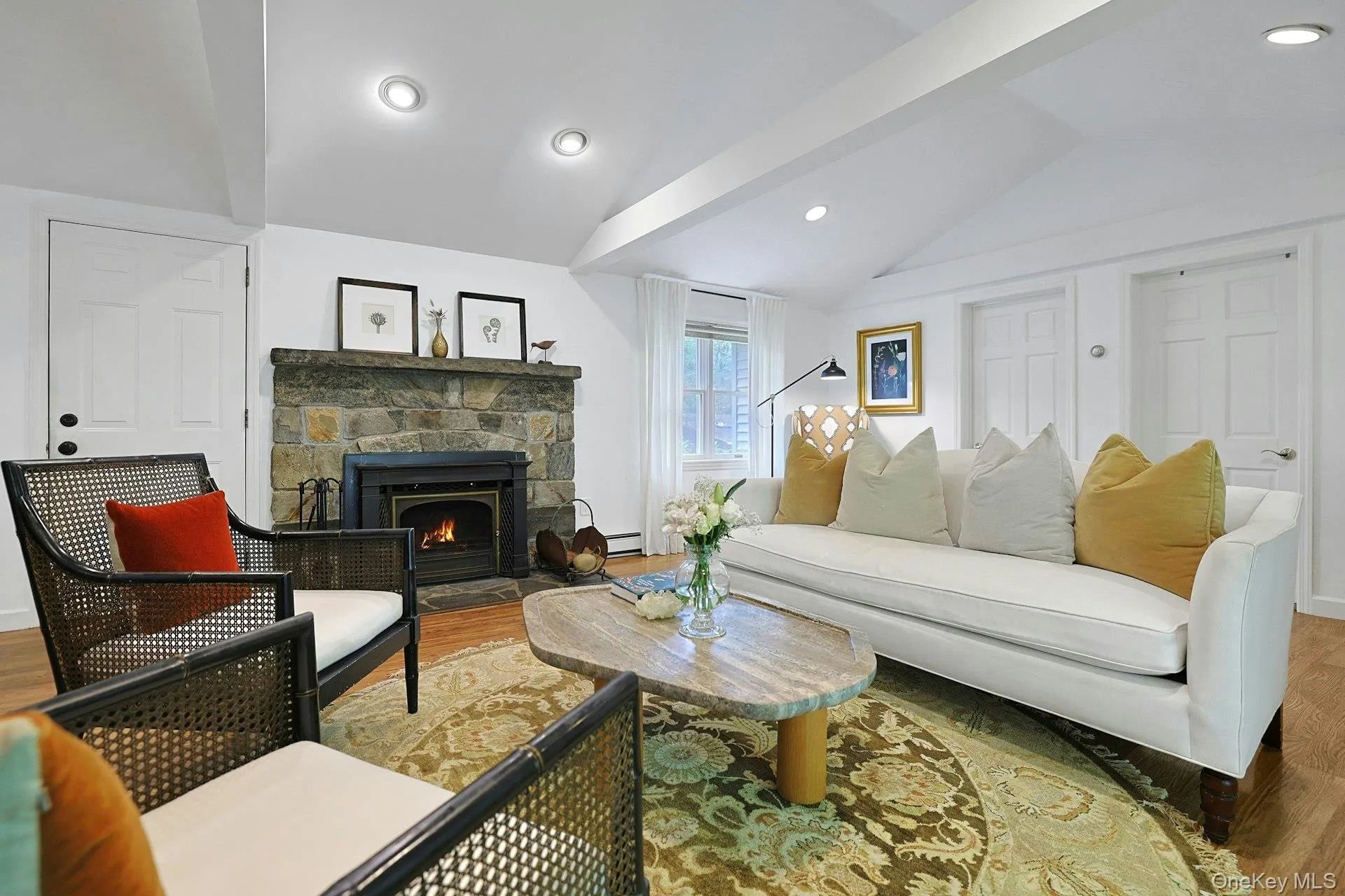 The stone fireplace has an insert for efficiency as well as safety and ease of use. The stone fireplace has an insert for efficiency as well as safety and ease of use.