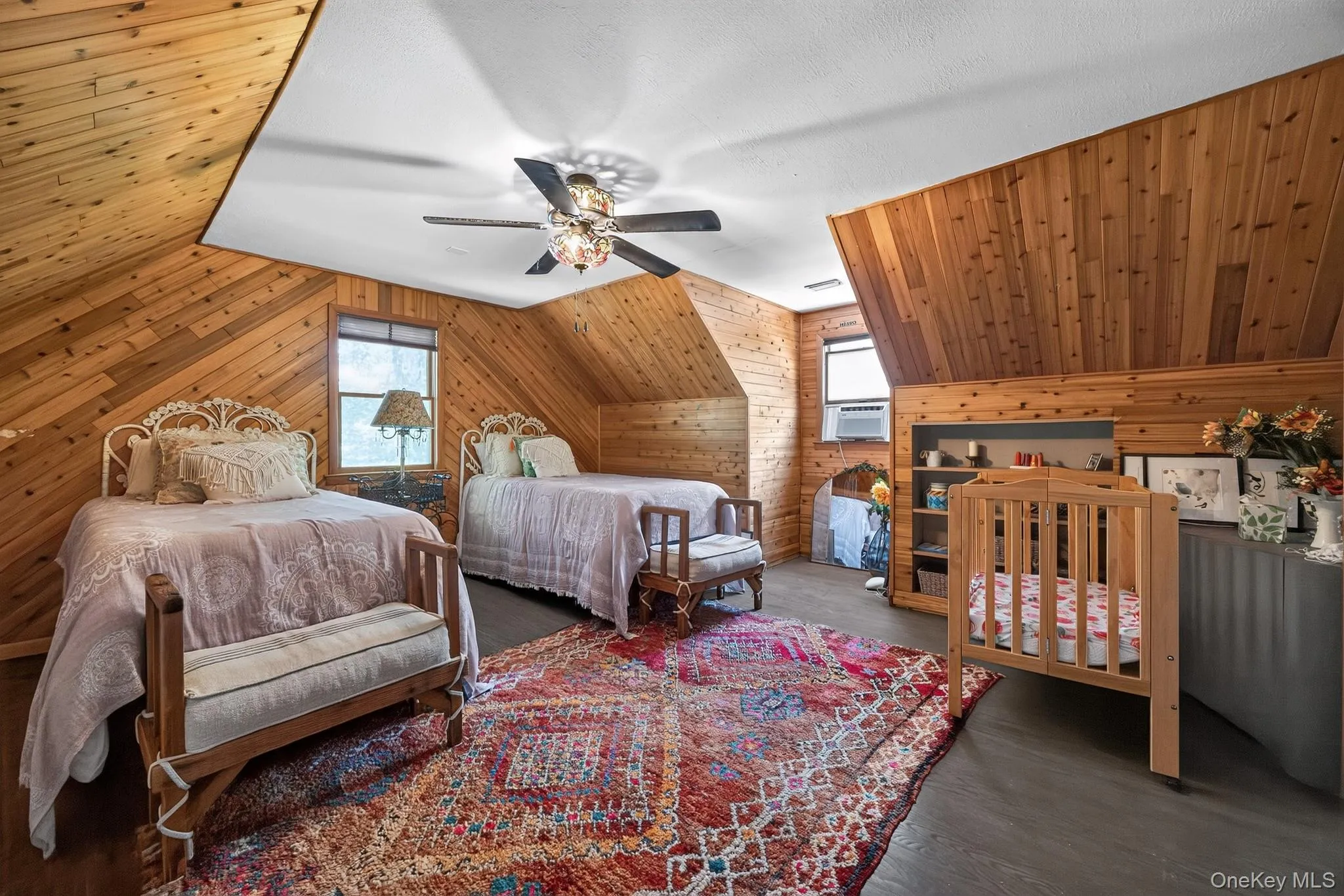 Sloped ceilings with wood-paneled walls Sloped ceilings with wood-paneled walls