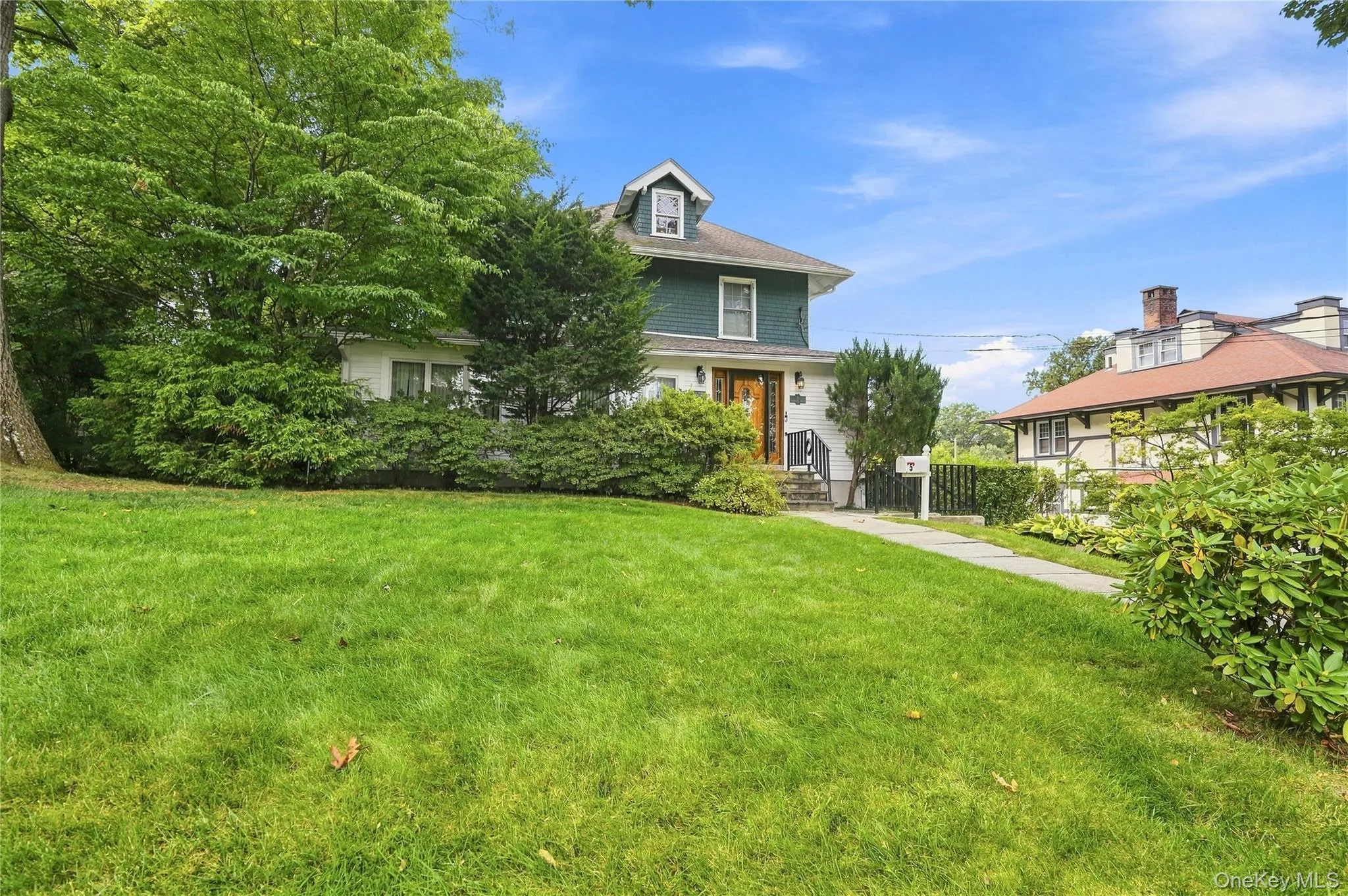 Expansive front lawn beautifully showcases the home Expansive front lawn beautifully showcases the home