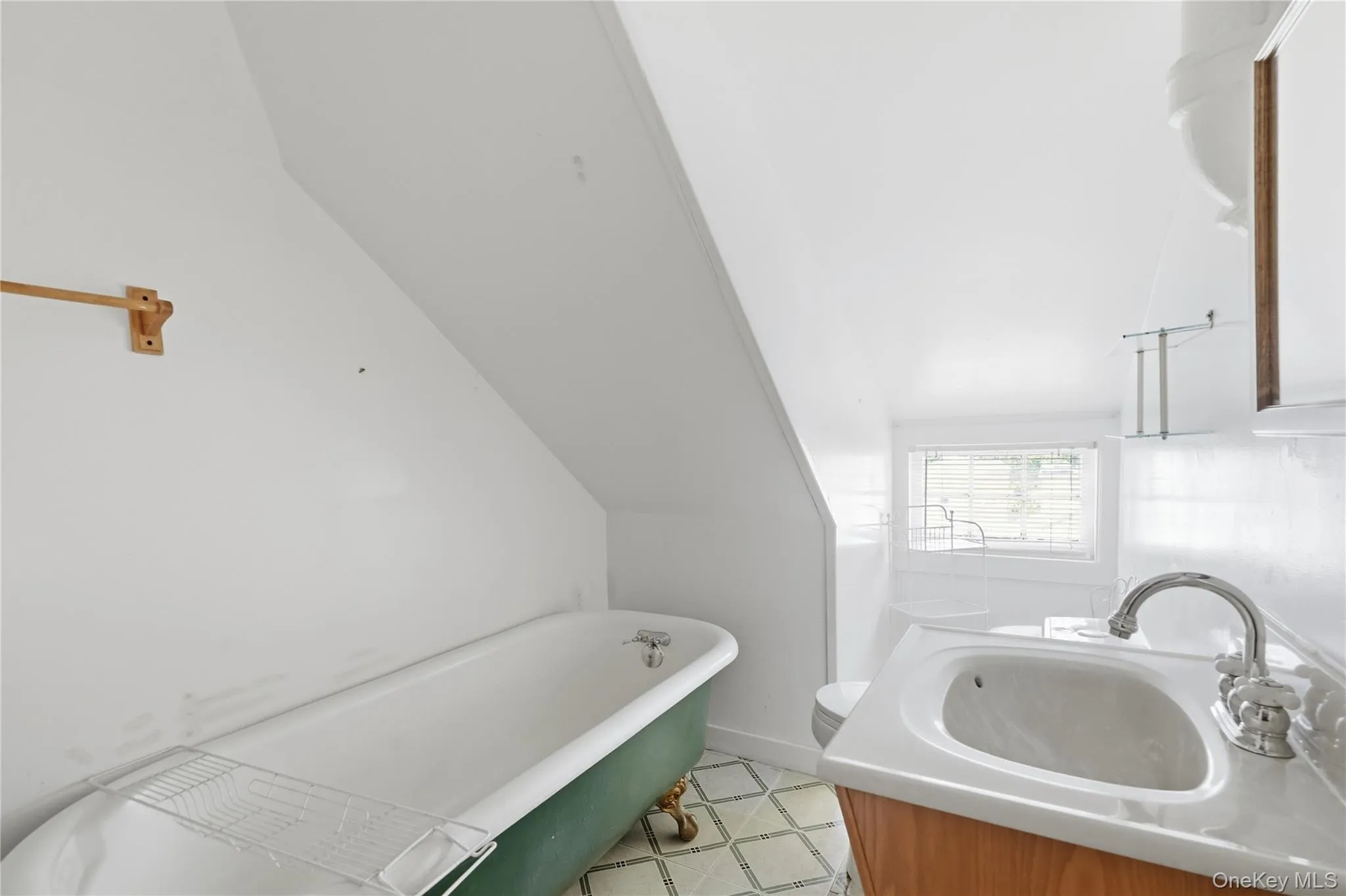 Convenient additional bathroom serves the upper-level retreat Convenient additional bathroom serves the upper-level retreat