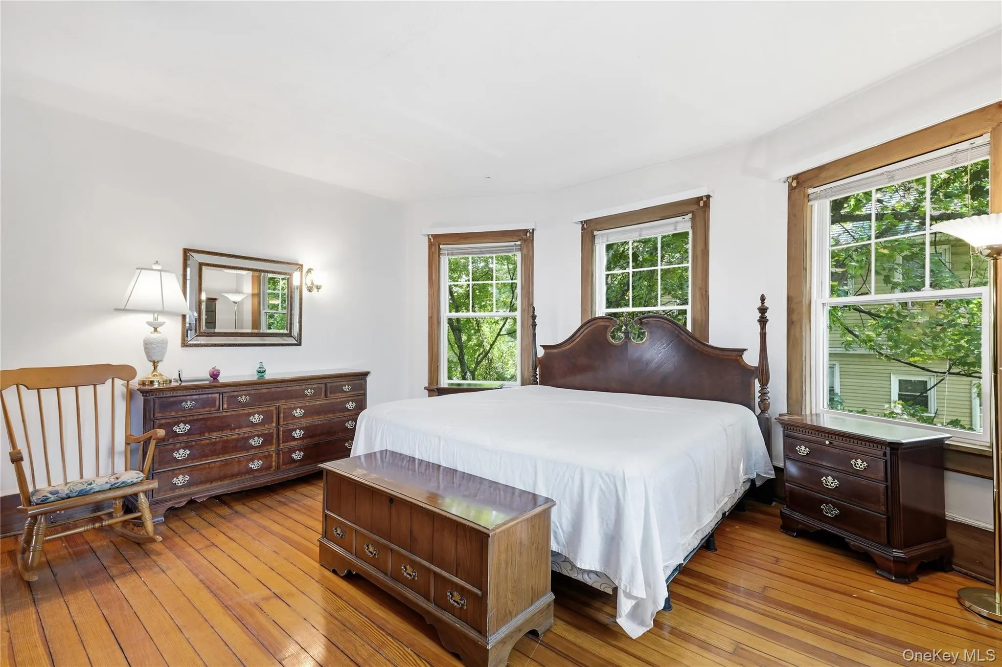 Abundant natural light creates a peaceful primary retreat Abundant natural light creates a peaceful primary retreat