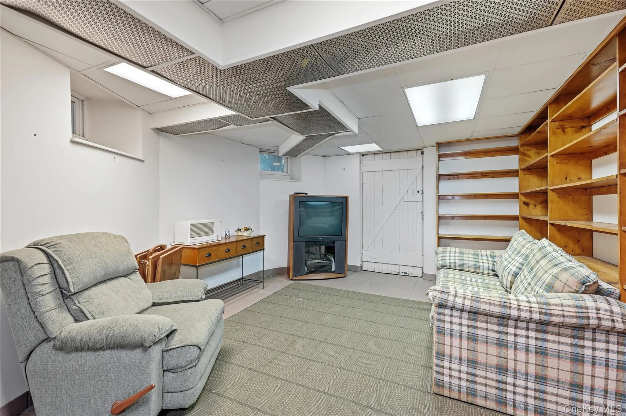 Spacious recreation room is ready for games and gatherings Spacious recreation room is ready for games and gatherings