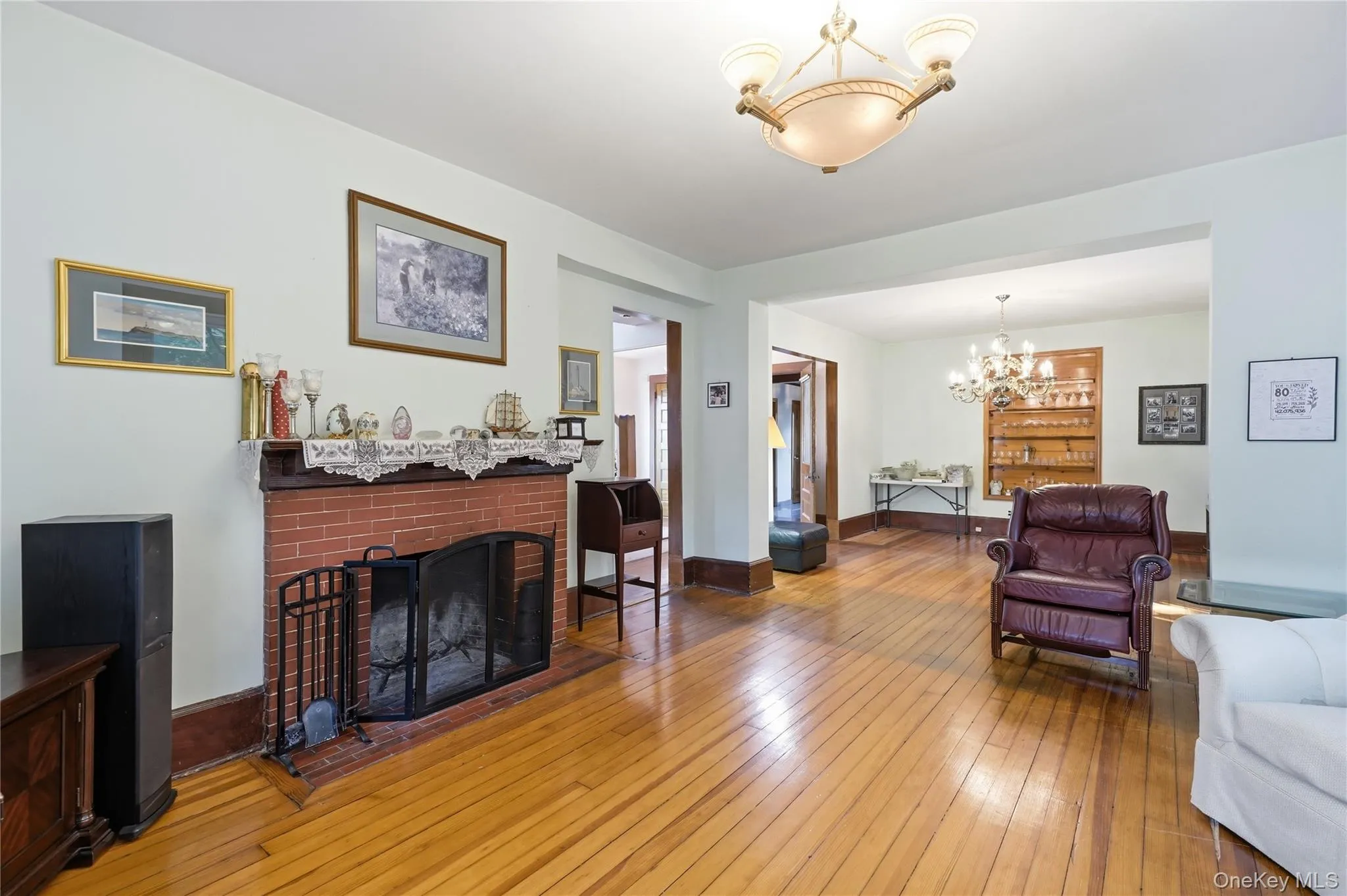 Sunlit living room showcases beautiful hardwood floors Sunlit living room showcases beautiful hardwood floors