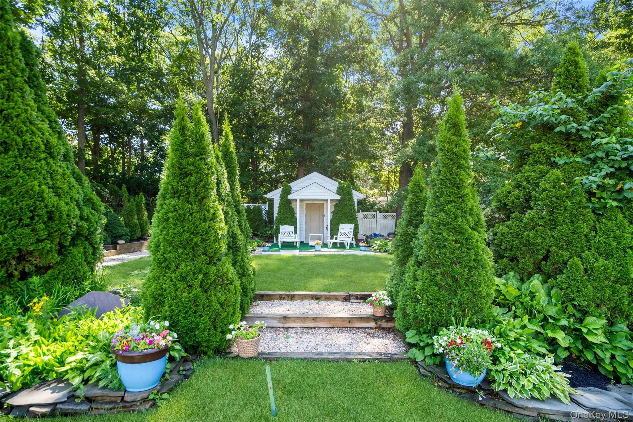12' x 12' shed with a raised platform, two separate entrances, a loft, full electric, a portico awning, and an alarm system. 12' x 12' shed with a raised platform, two separate entrances, a loft, full electric, a portico awning, and an alarm system.