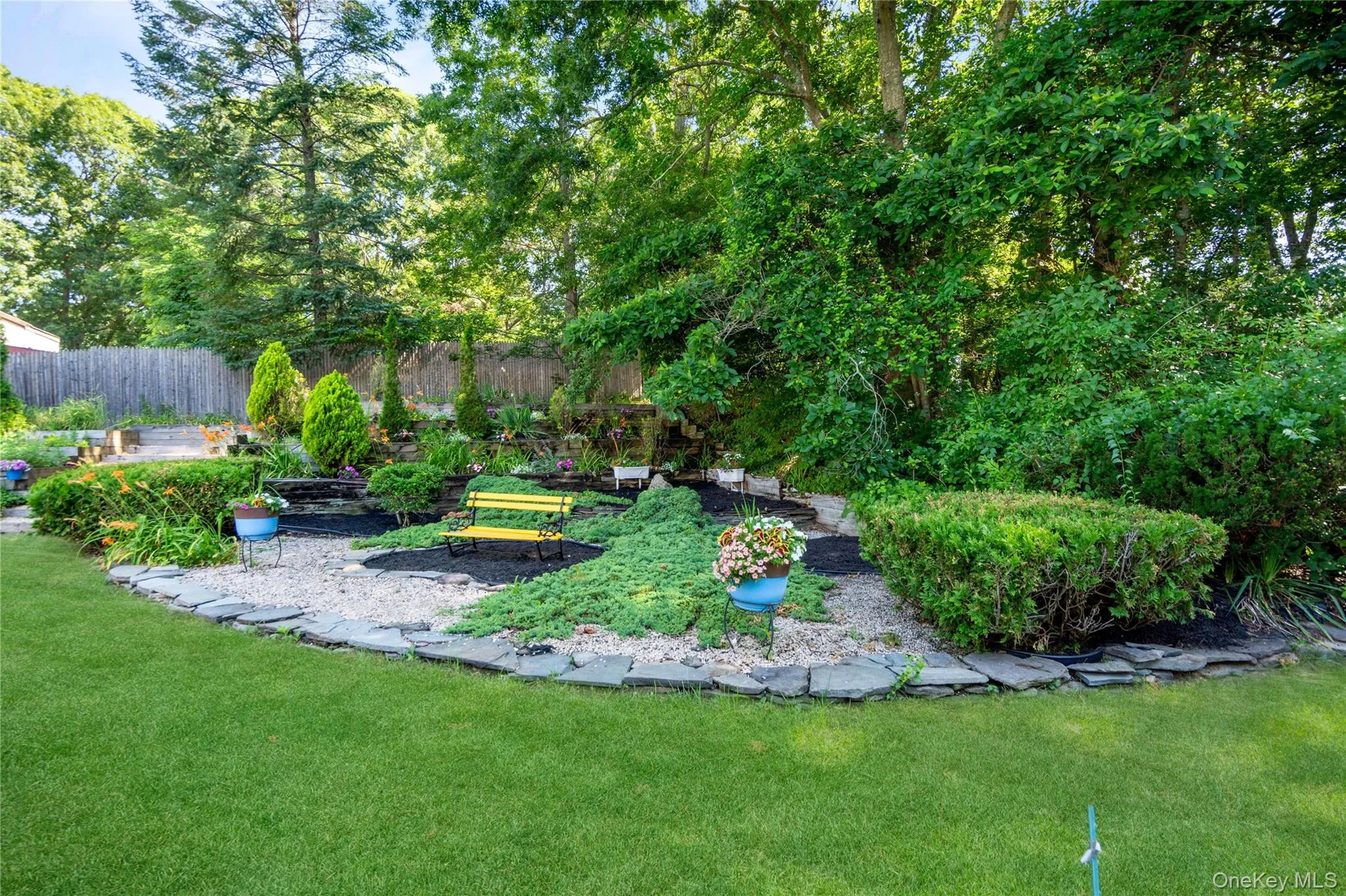 Koi pond with a three-level waterfall, full plumbing and filtration system, and a covered design complete with a dedicated viewing bench. Koi pond with a three-level waterfall, full plumbing and filtration system, and a covered design complete with a dedicated viewing bench.