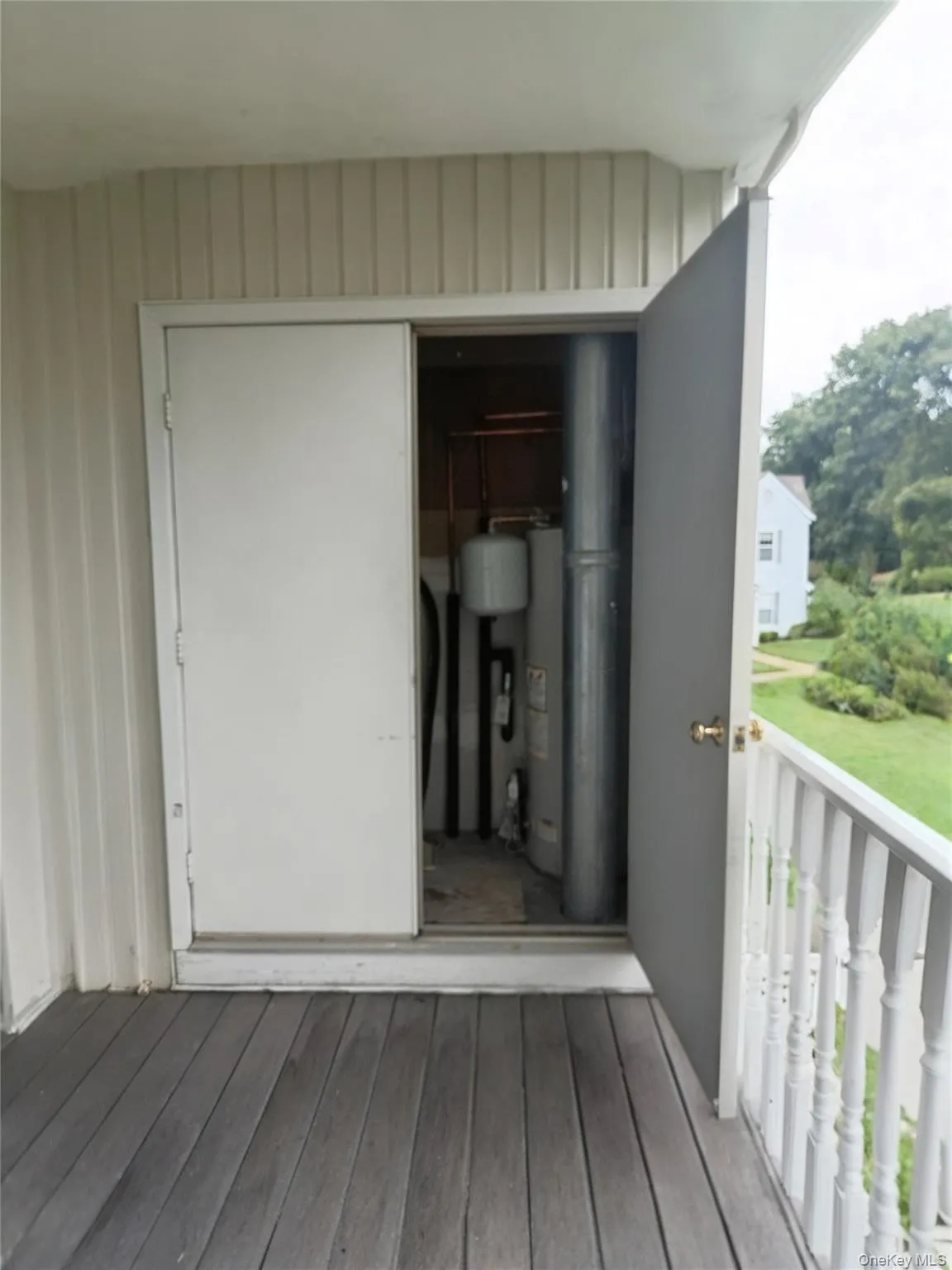 Large deck with utility closet. New Gas boiler and Hot water heater Large deck with utility closet. New Gas boiler and Hot water heater