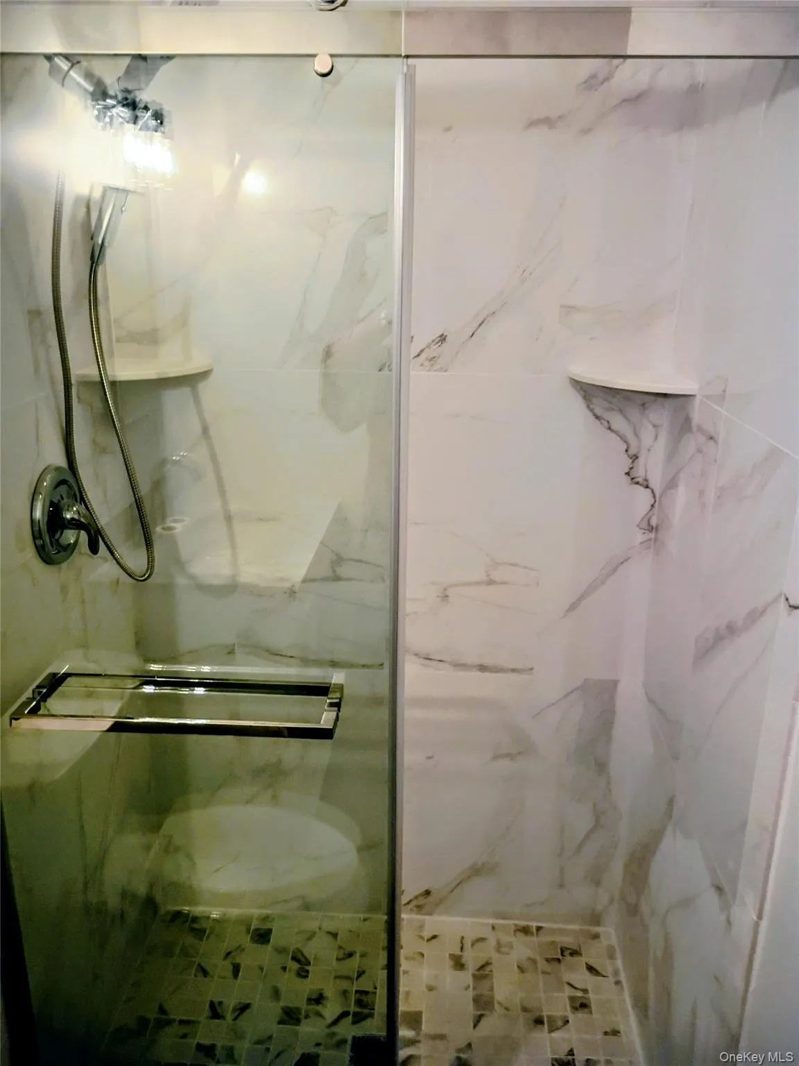 Ceramic tiled shower with built in shampoo holder Ceramic tiled shower with built in shampoo holder