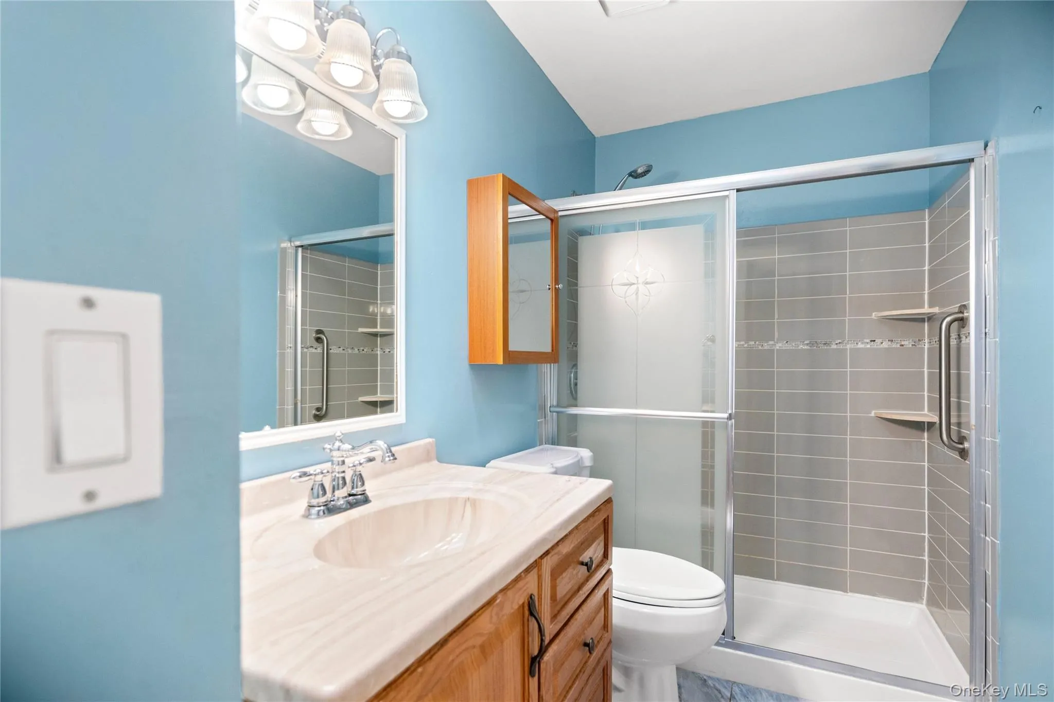 Tile shower, bathtub, glass shower doors. Tile shower, bathtub, glass shower doors.
