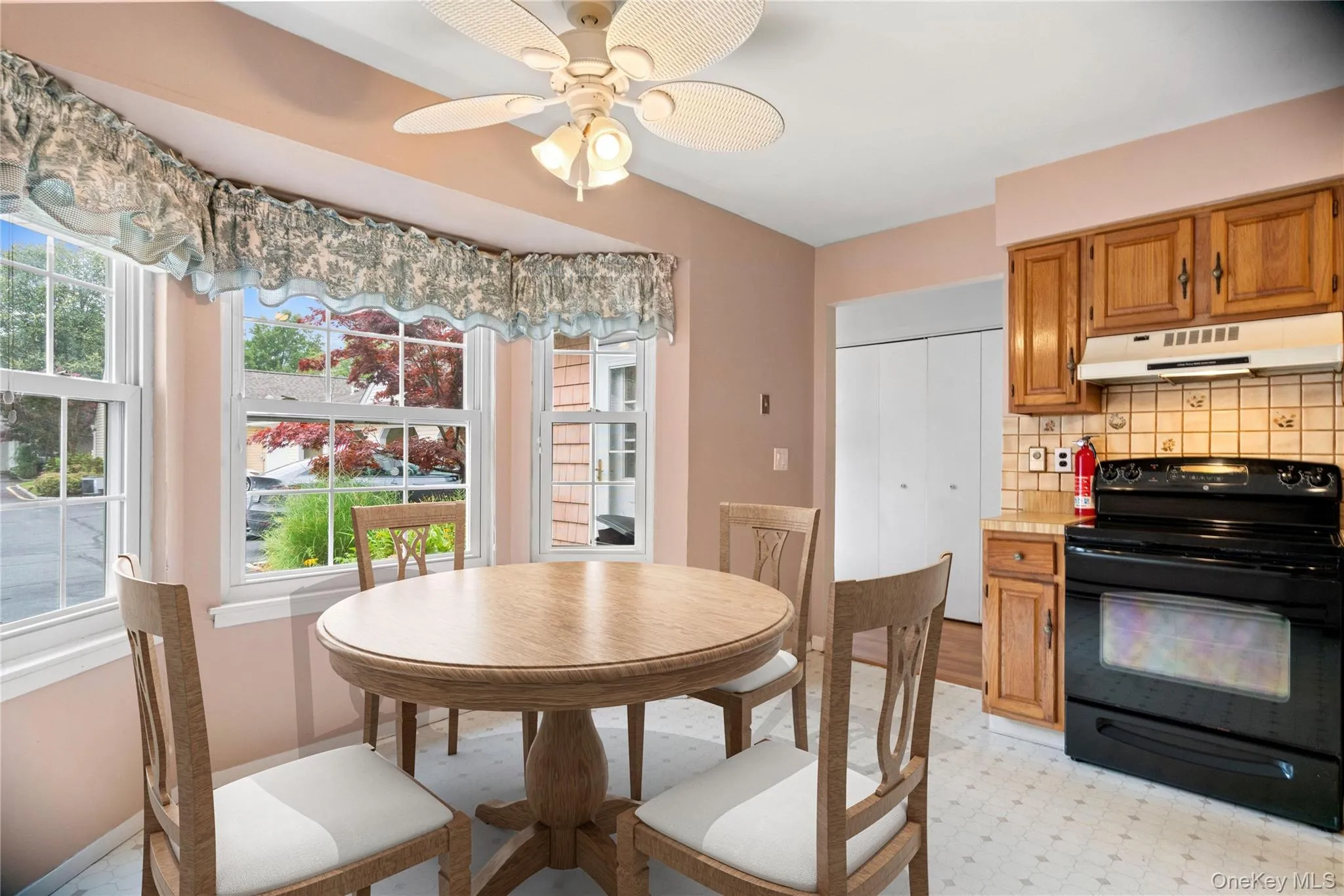 Virtually staged eat in kitchen with bay window. Virtually staged eat in kitchen with bay window.