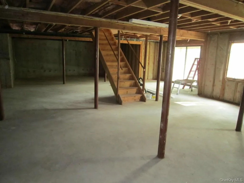 Photo of huge walkout basement prior to it being partially finished. Photo of huge walkout basement prior to it being partially finished.
