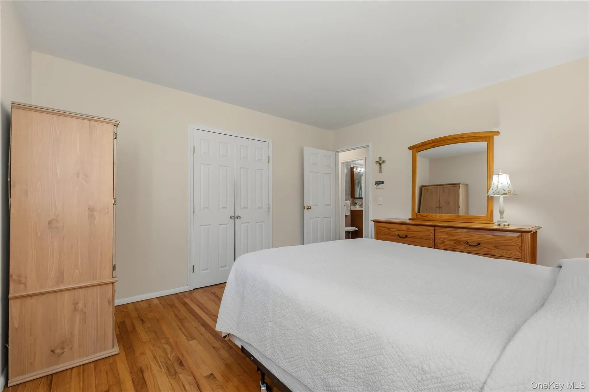 Primary bedroom room with hardwood floors Primary bedroom room with hardwood floors