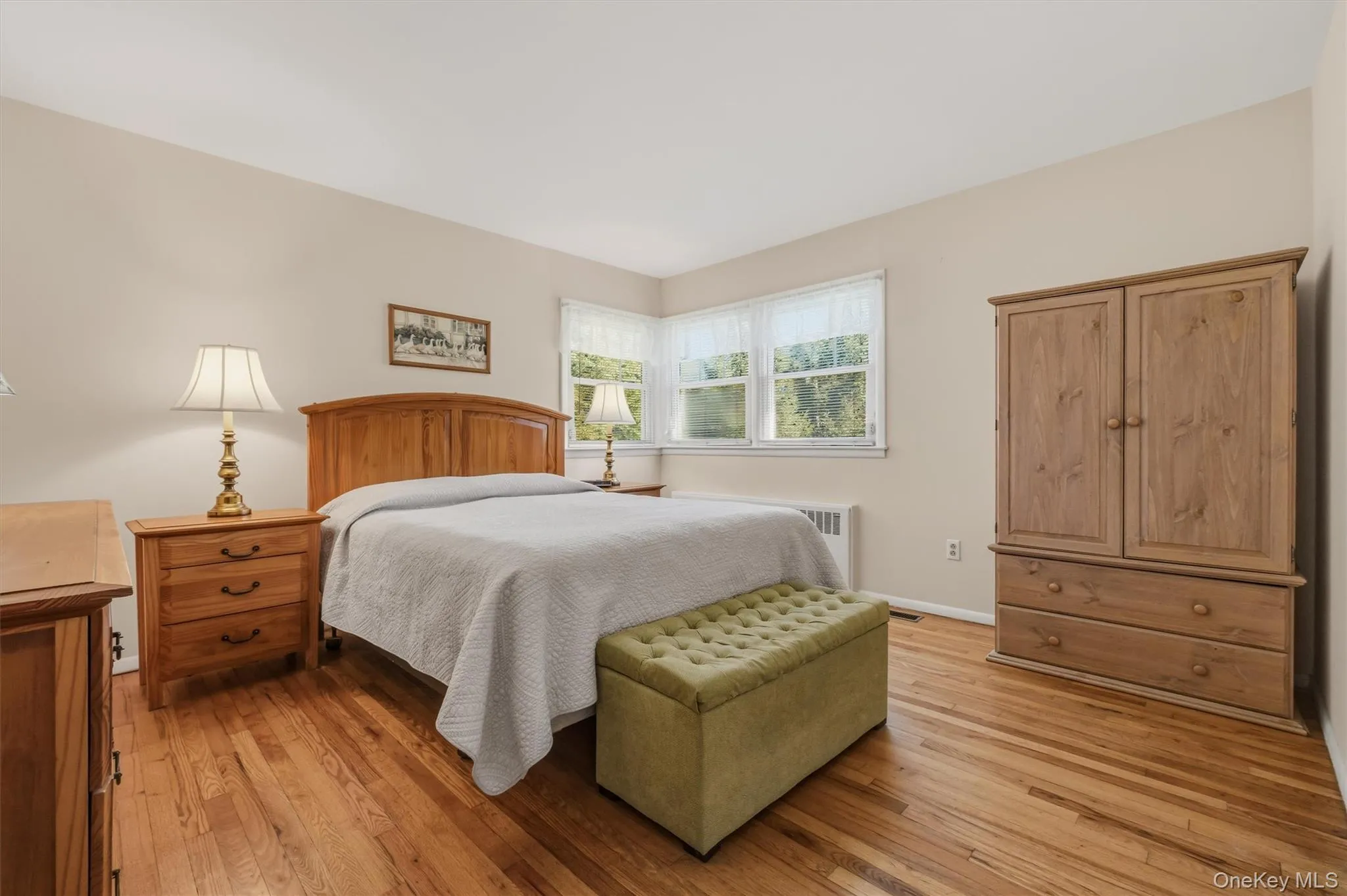 Primary bedroom room with hardwood floors Primary bedroom room with hardwood floors