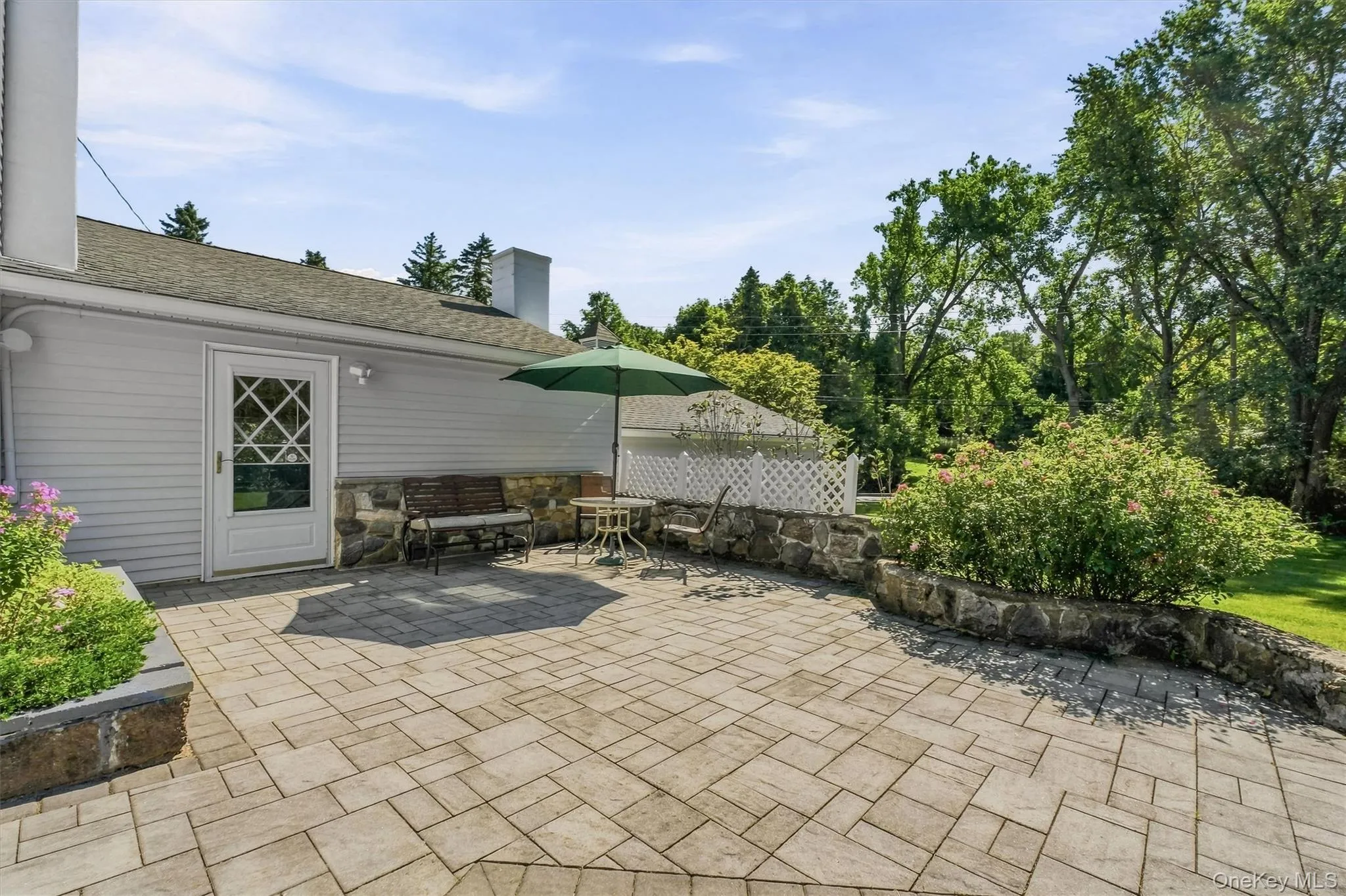 Expansive patio done in pavers adds nice character to backyard and perfect for entertaining Expansive patio done in pavers adds nice character to backyard and perfect for entertaining
