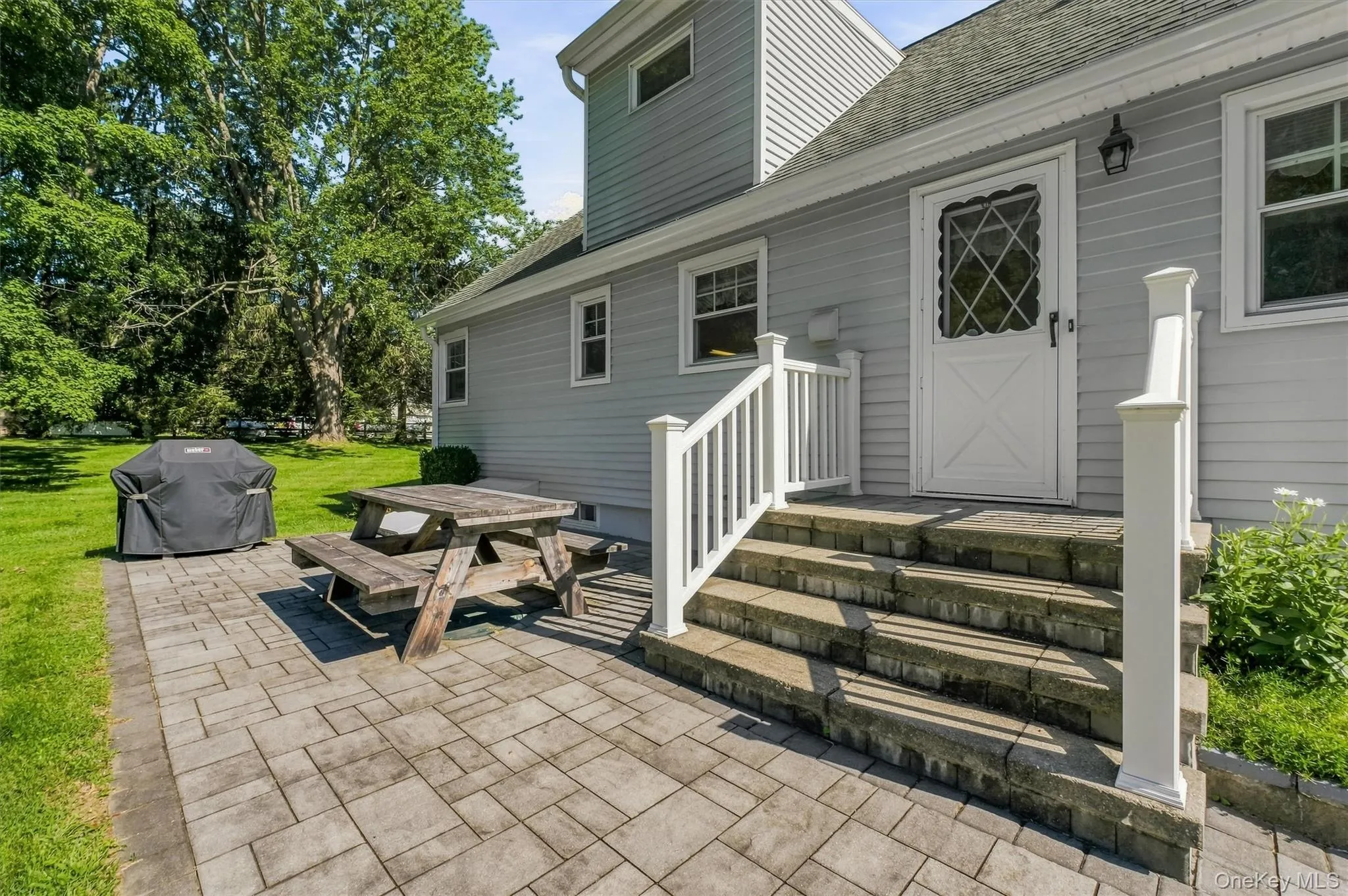 Expansive patio done in pavers adds nice character to backyard and perfect for entertaining Expansive patio done in pavers adds nice character to backyard and perfect for entertaining