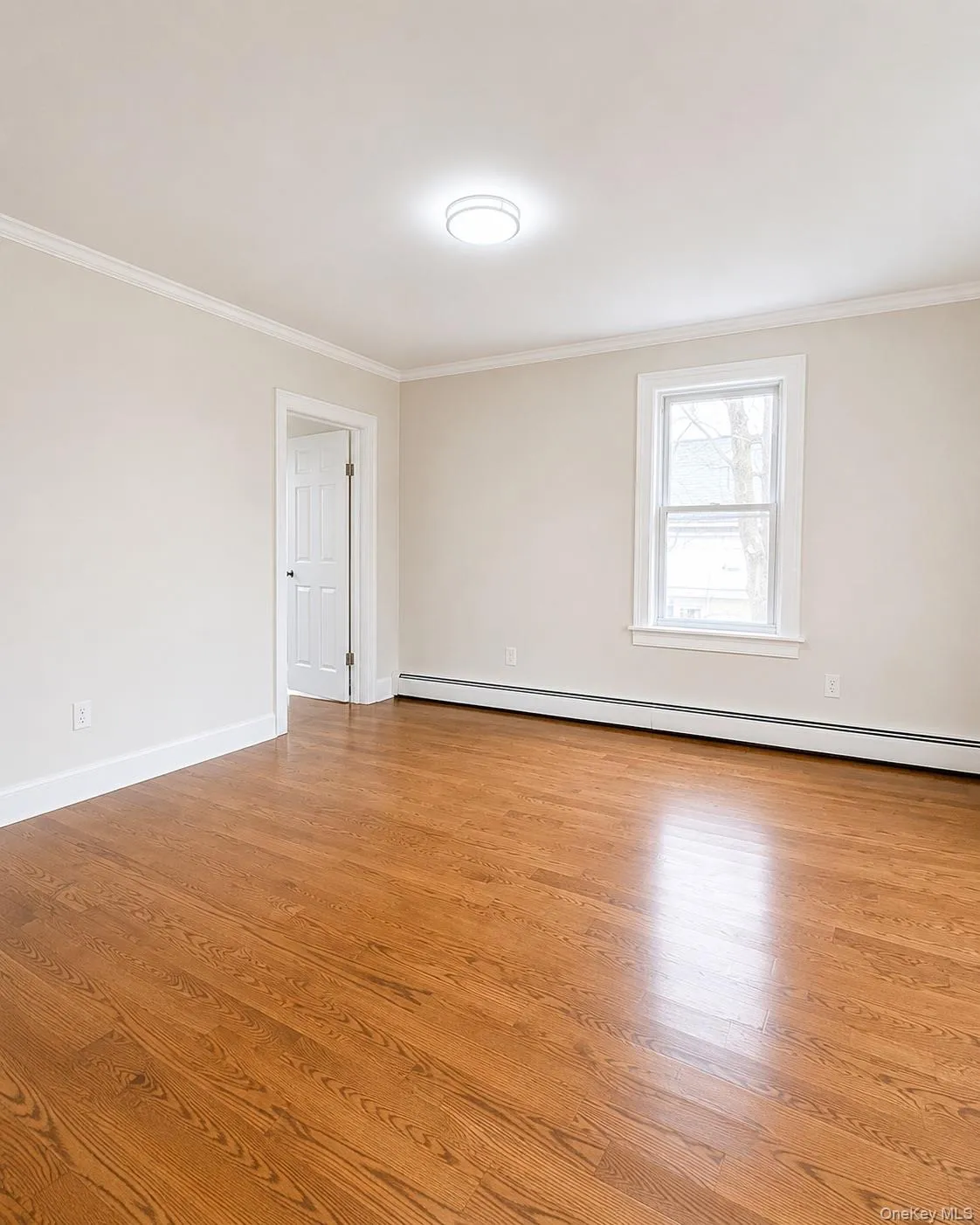 Formal dining area with doorway leading to living area Formal dining area with doorway leading to living area