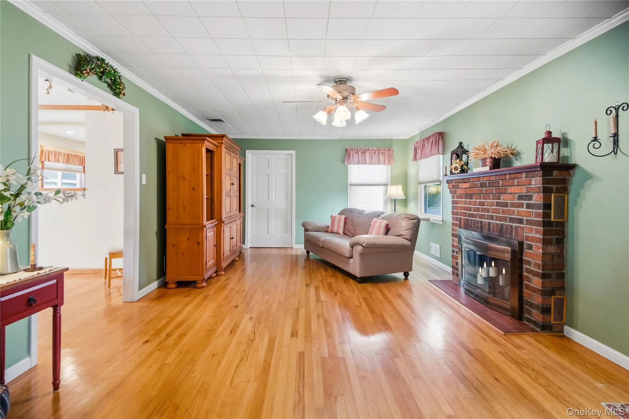Enter into this spacious area w/woodburning fireplace Enter into this spacious area w/woodburning fireplace