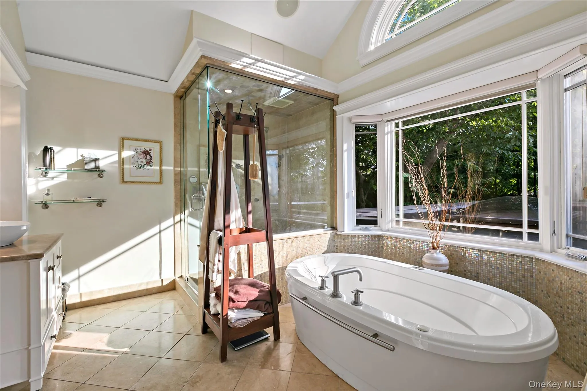 Spa-like Primary Bathroom features Jacuzzi Tub, Skylight, Separate Steam Shower and Double Vanities Spa-like Primary Bathroom features Jacuzzi Tub, Skylight, Separate Steam Shower and Double Vanities