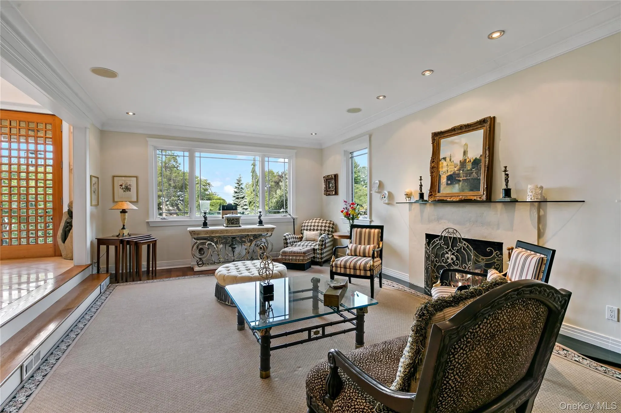 Formal Step Down Living Room features Wood-burning Fireplace Formal Step Down Living Room features Wood-burning Fireplace