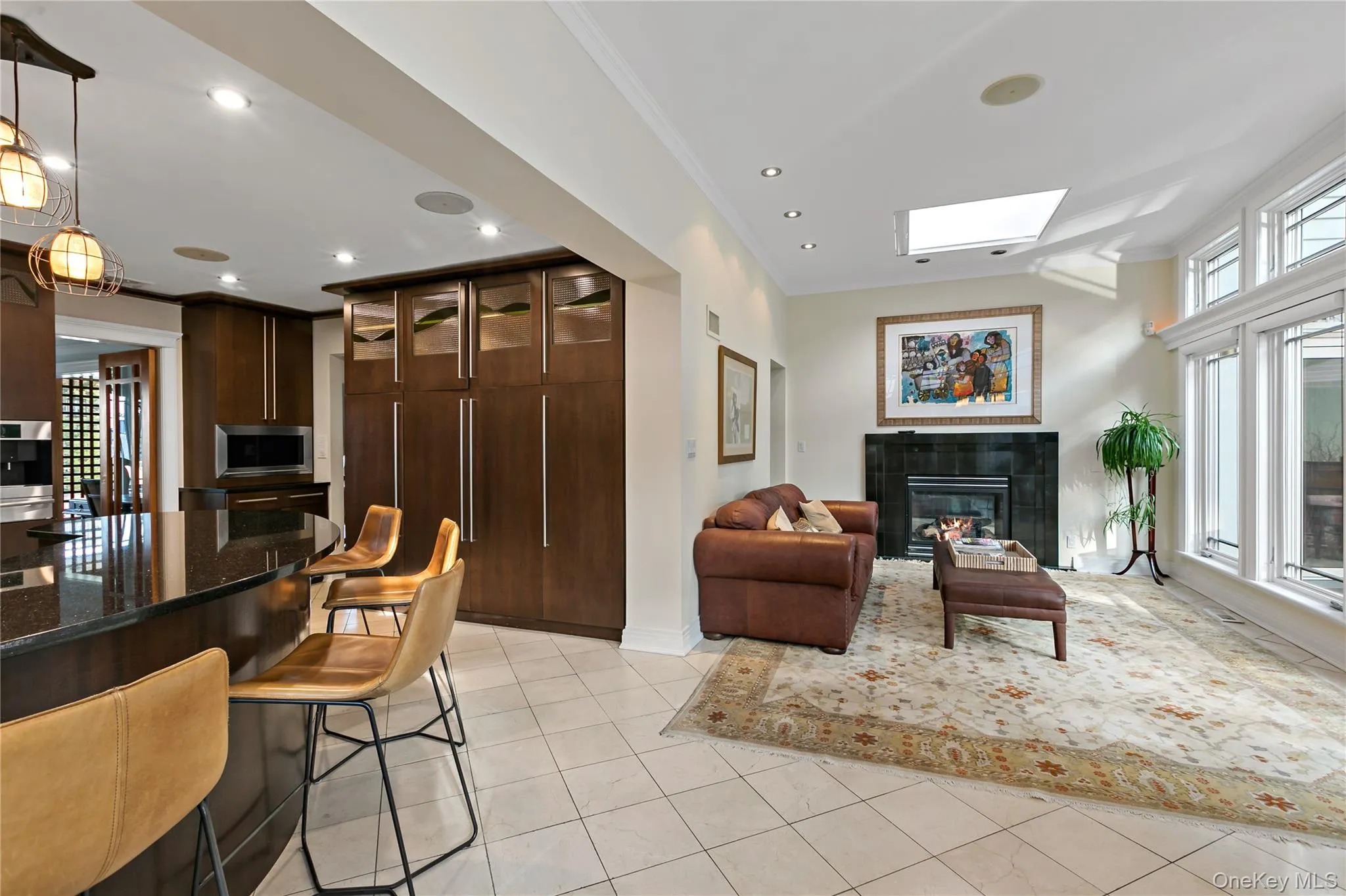 View of Family Room and Kitchen Peninsula Island with Ample Seating View of Family Room and Kitchen Peninsula Island with Ample Seating