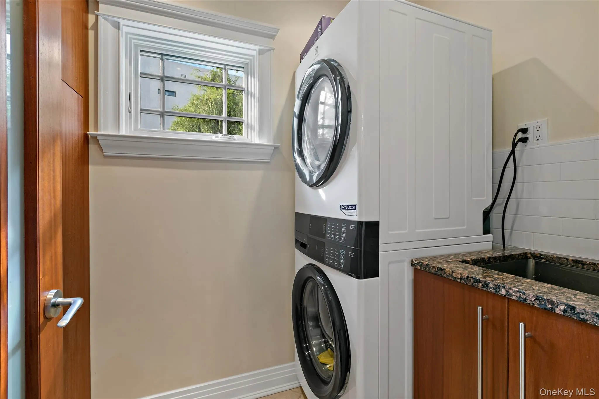 Laundry Room Located off the Kitchen Laundry Room Located off the Kitchen
