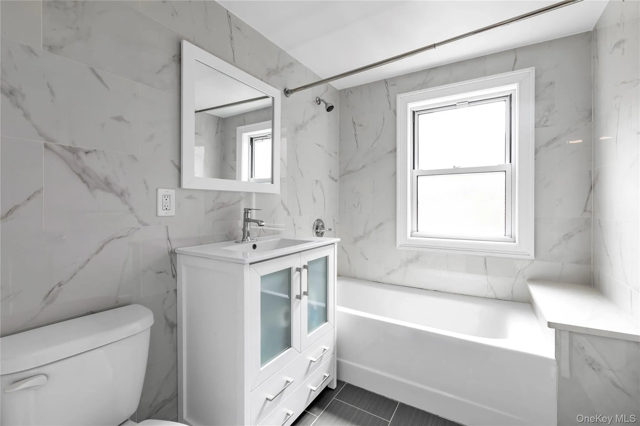 windowed bathroom with tilework to the ceiling windowed bathroom with tilework to the ceiling