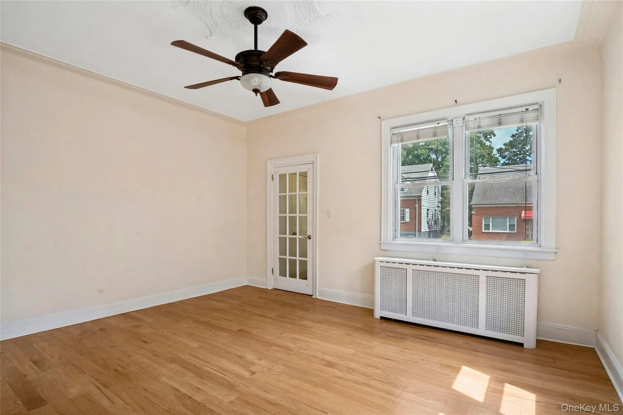 Living room, with door to the foyer. Living room, with door to the foyer.