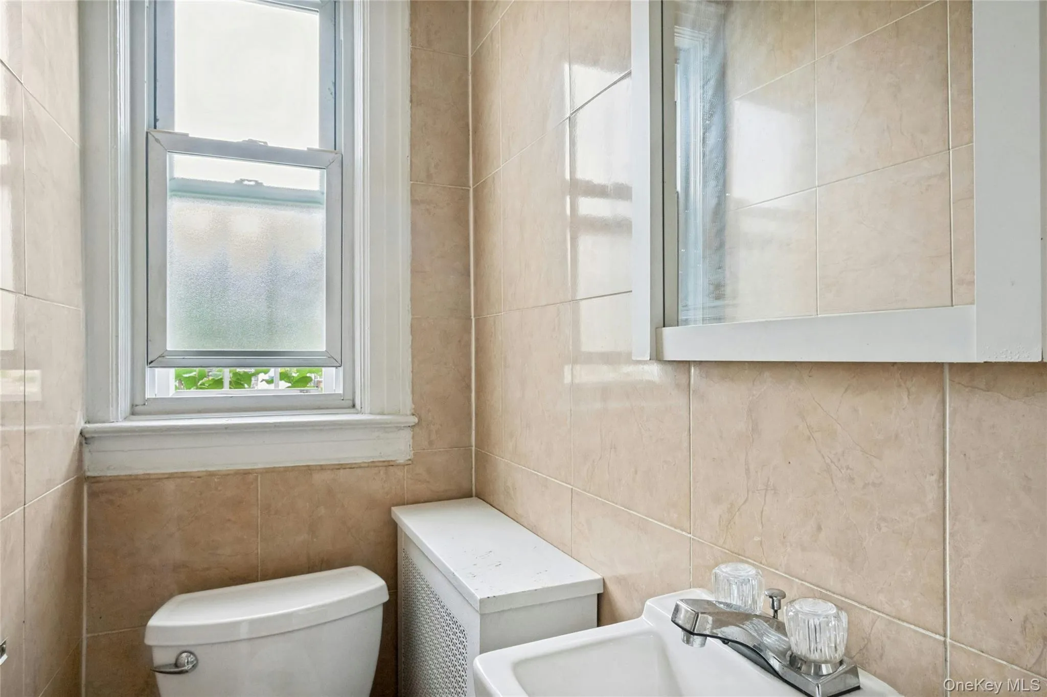 Powder room on first floor by kitchen and backdoor Powder room on first floor by kitchen and backdoor