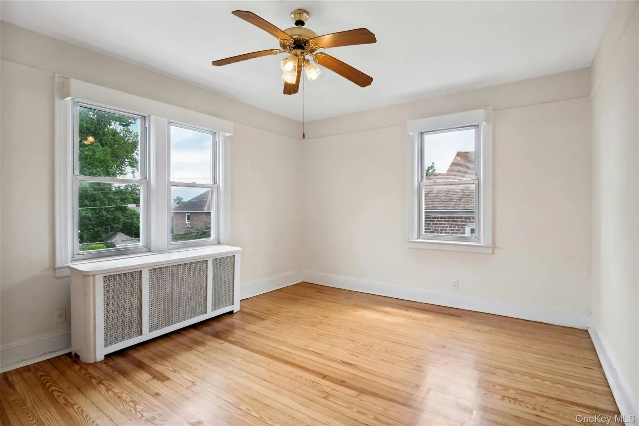 #1 Bedroom with ceiling fan, beautiful wood floors and closet #1 Bedroom with ceiling fan, beautiful wood floors and closet
