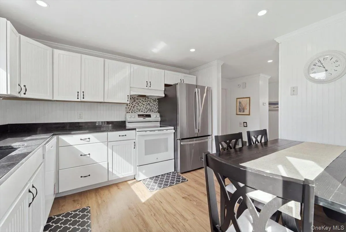 EIK with sliding glass doors to deck overlooking backyard EIK with sliding glass doors to deck overlooking backyard